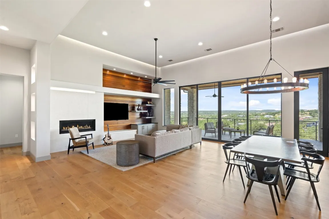 a living room with furniture fireplace and a flat screen tv