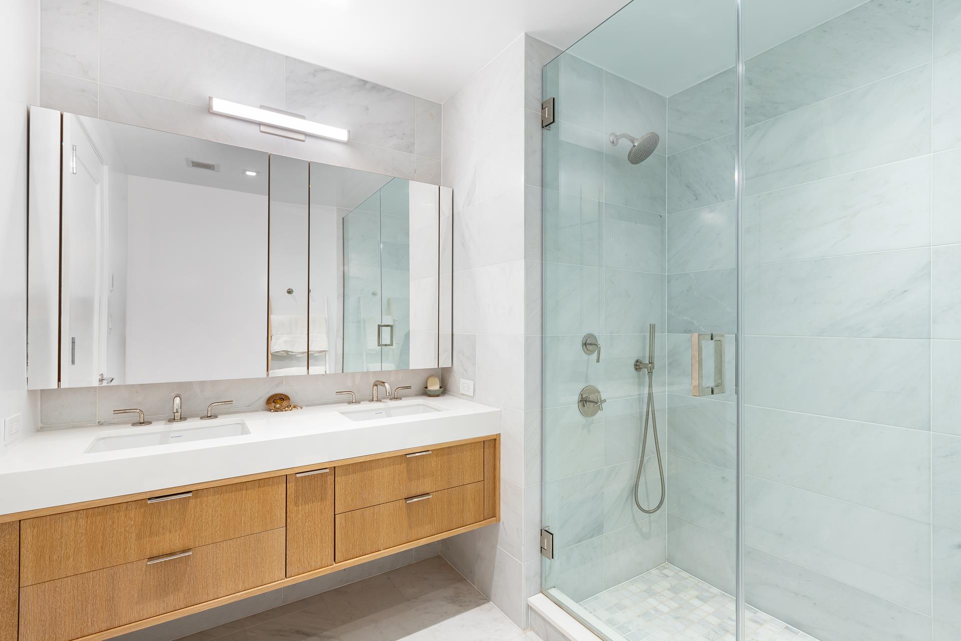 78 Amity Street, Unit 4D Brooklyn, NY 11201 - Photo 6 of 15 a bathroom with a double vanity sink mirror and double