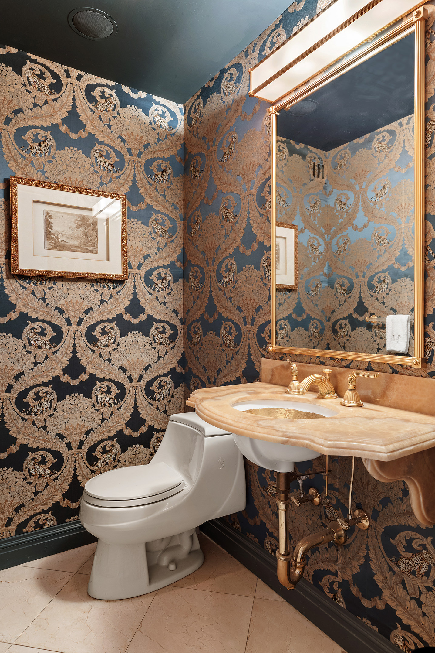 785 5th Avenue, Unit 5C Manhattan, NY 10022 - Photo 9 of 14 a bathroom with a sink and a toilet