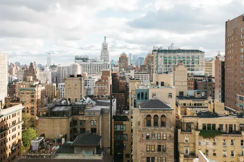 a view of a city with tall buildings