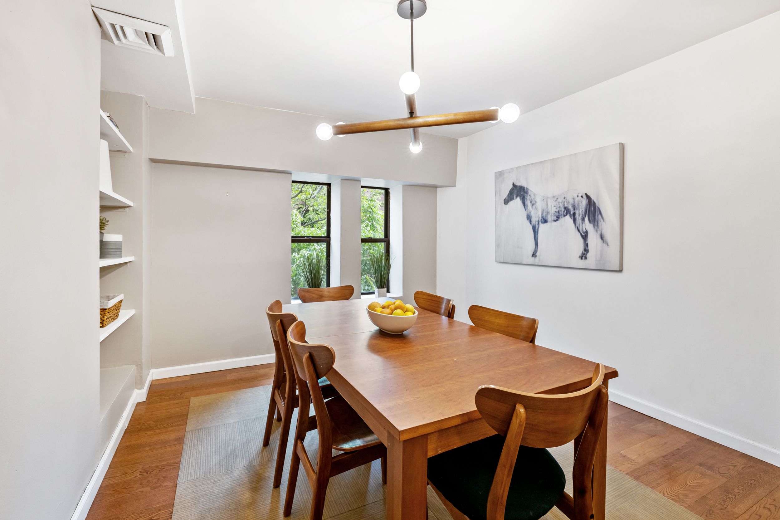 248 East 31st Street, Unit 4A Manhattan, NY 10016 - Photo 6 of 14 a view of a dining room with furniture window and wooden floor