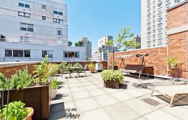 510 East 80th Street, Unit 4D Manhattan, NY 10075 - Photo 19 of 20 a view of a patio with plants and outdoor seating