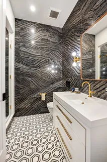 a bathroom with a sink and a shower