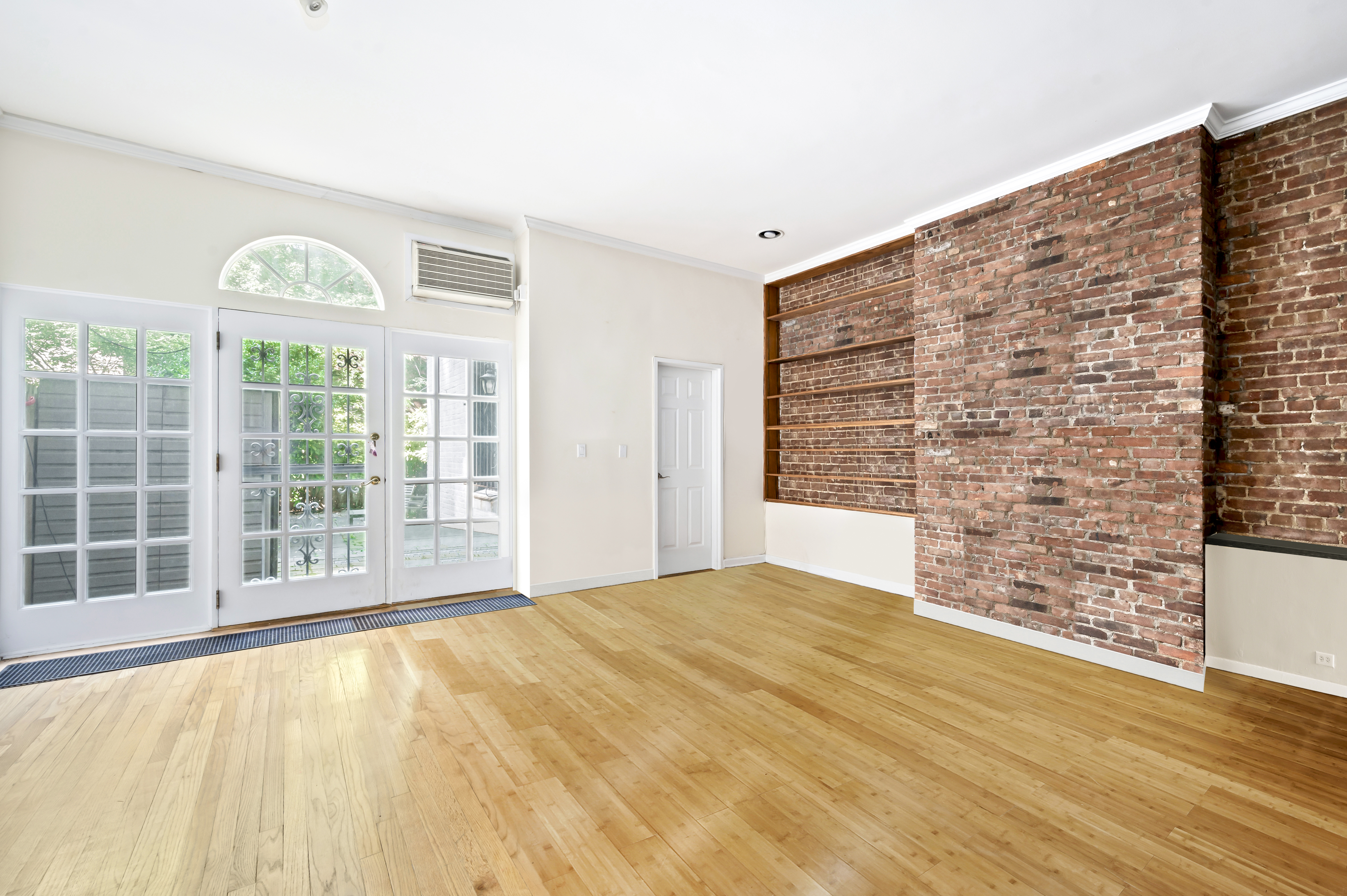 53 West 94th Street Manhattan, NY 10025 - Photo 3 of 12 a view of an empty room with a window