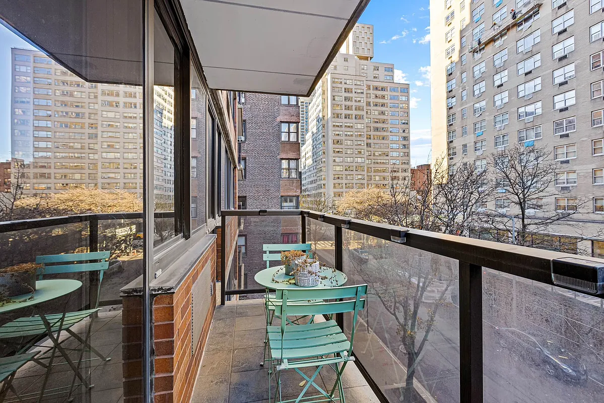 510 East 80th Street, Unit 4D Manhattan, NY 10075 - Photo 5 of 20 a balcony view with two chairs and a table