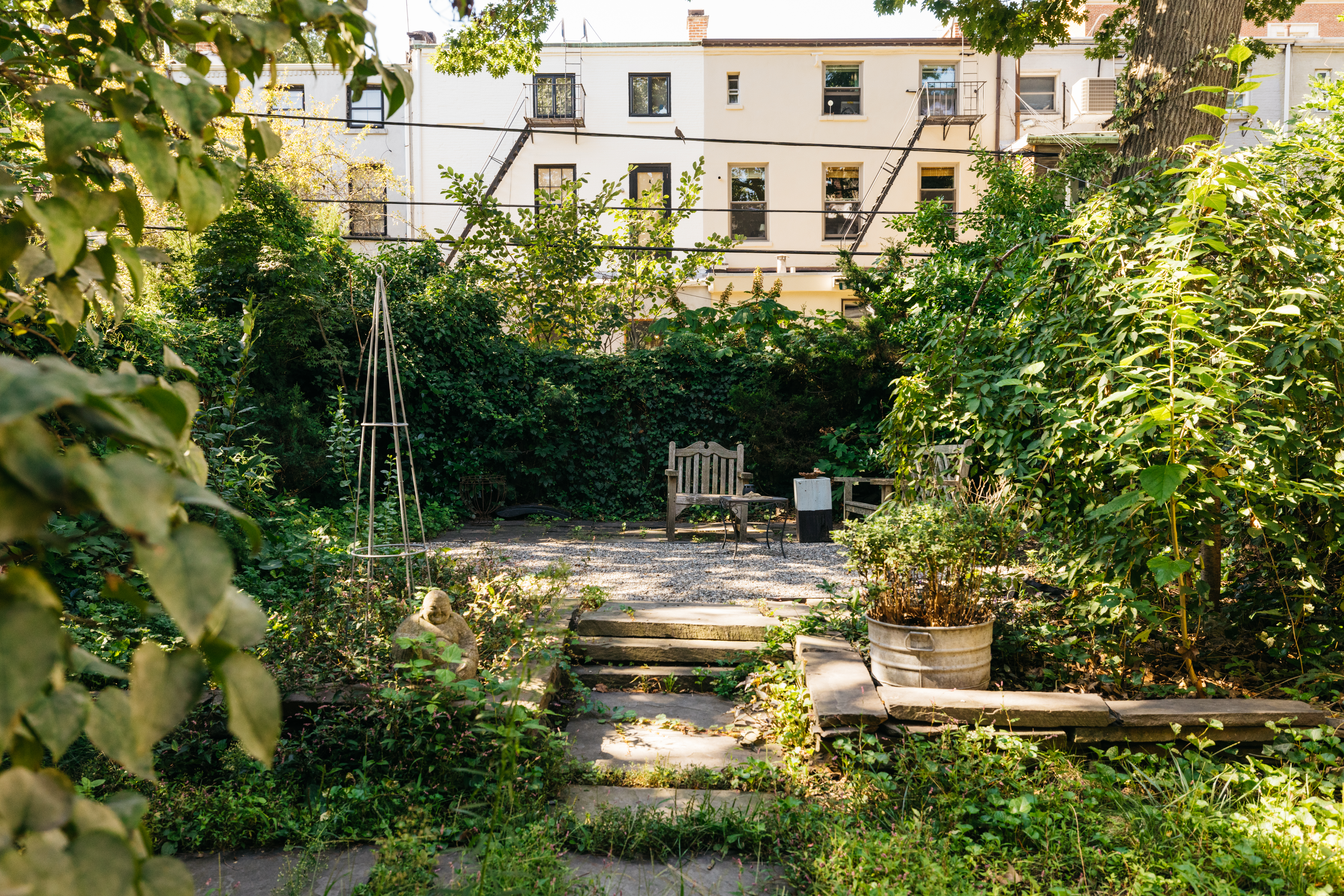 188 Warren Street, Unit TRIPLEX Brooklyn, NY 11201 - Photo 12 of 15 a view of swimming pool with lawn chairs and plants