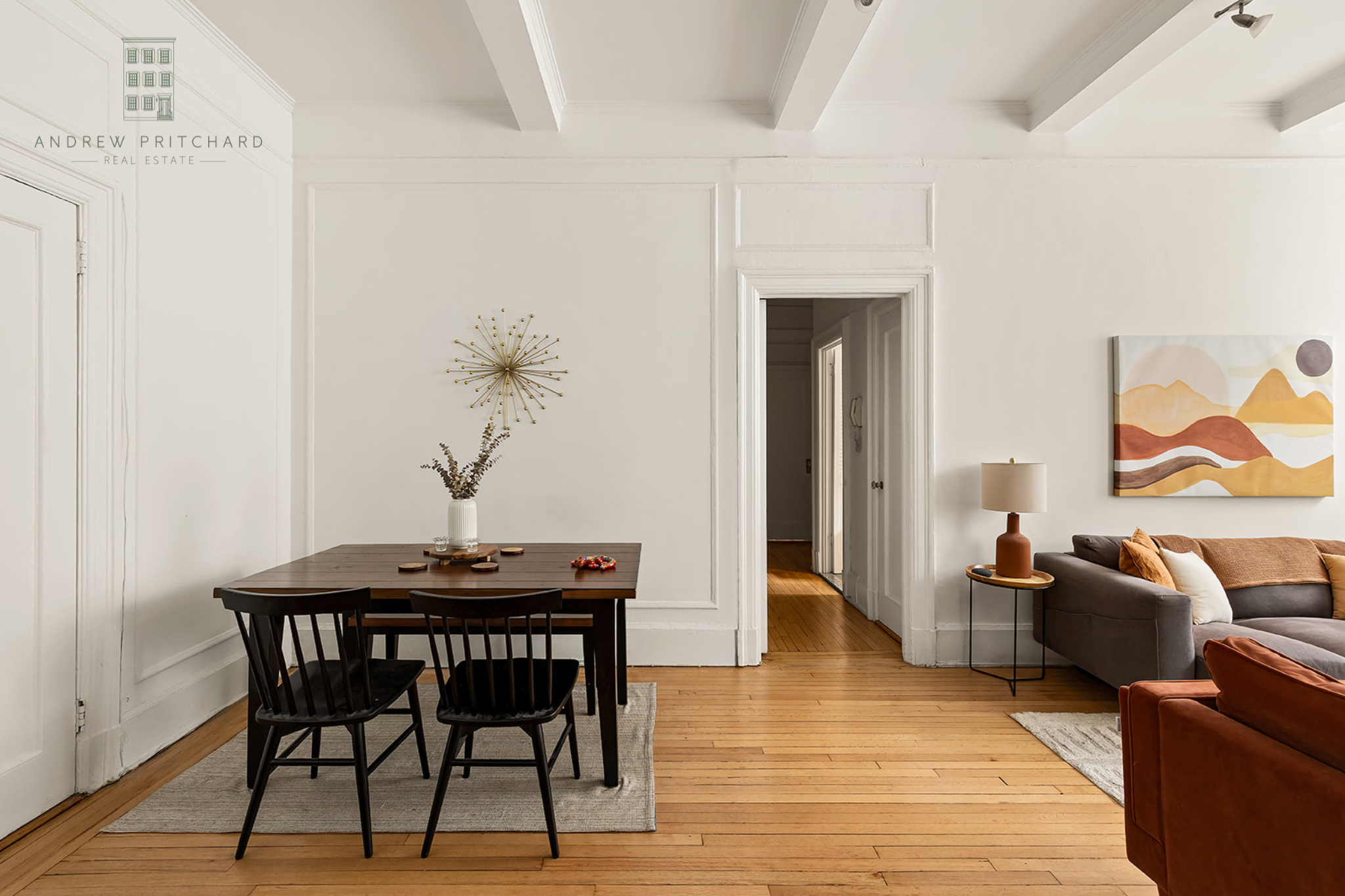 212 East 48th Street, Unit 1D Manhattan, NY 10017 - Photo 2 of 12 a view of a dining room with furniture and wooden floor