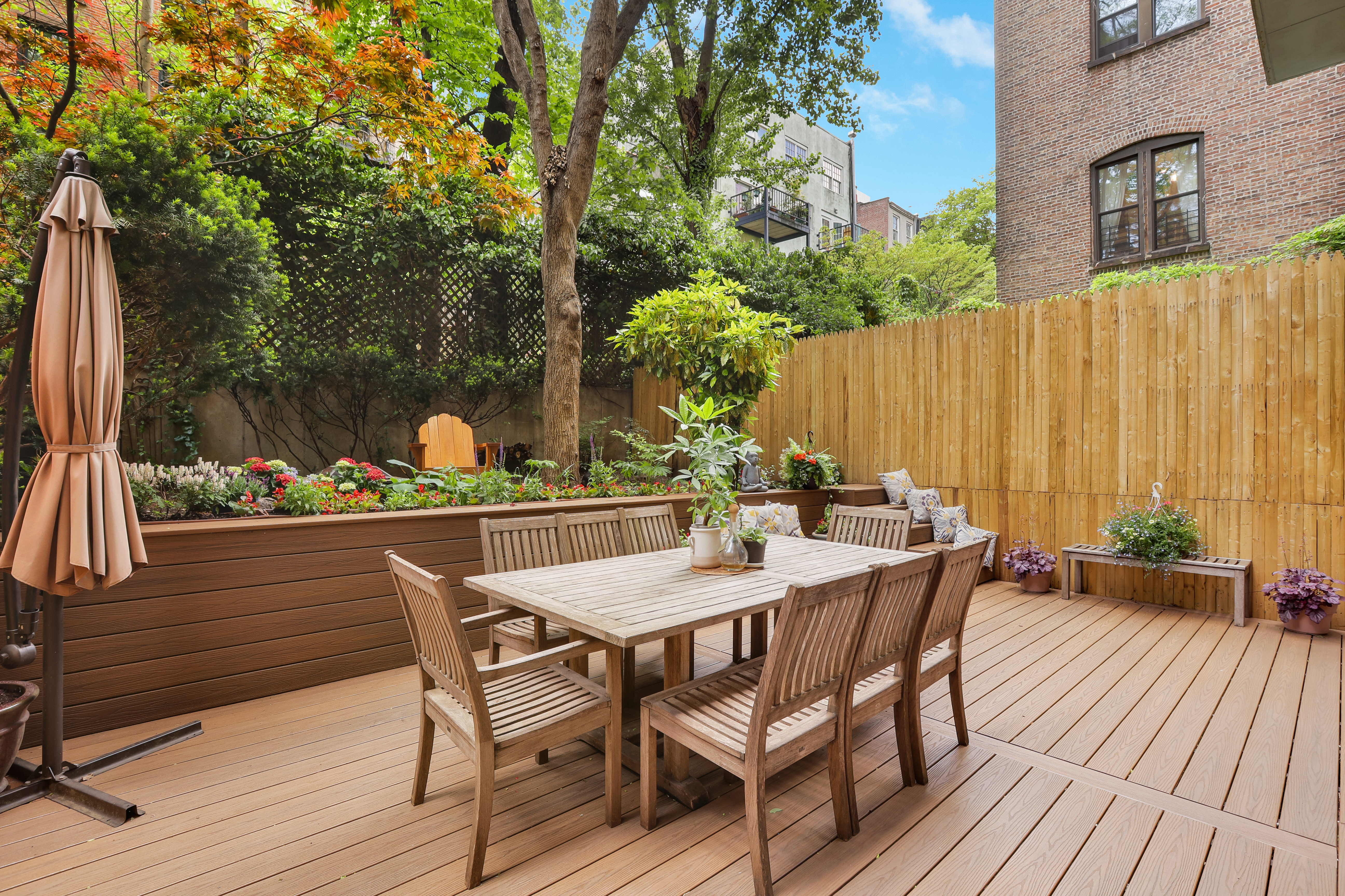 344 West 23rd Street, Unit 1E Manhattan, NY 10011 - Photo 1 of 18 a view of an outside dining space with furniture