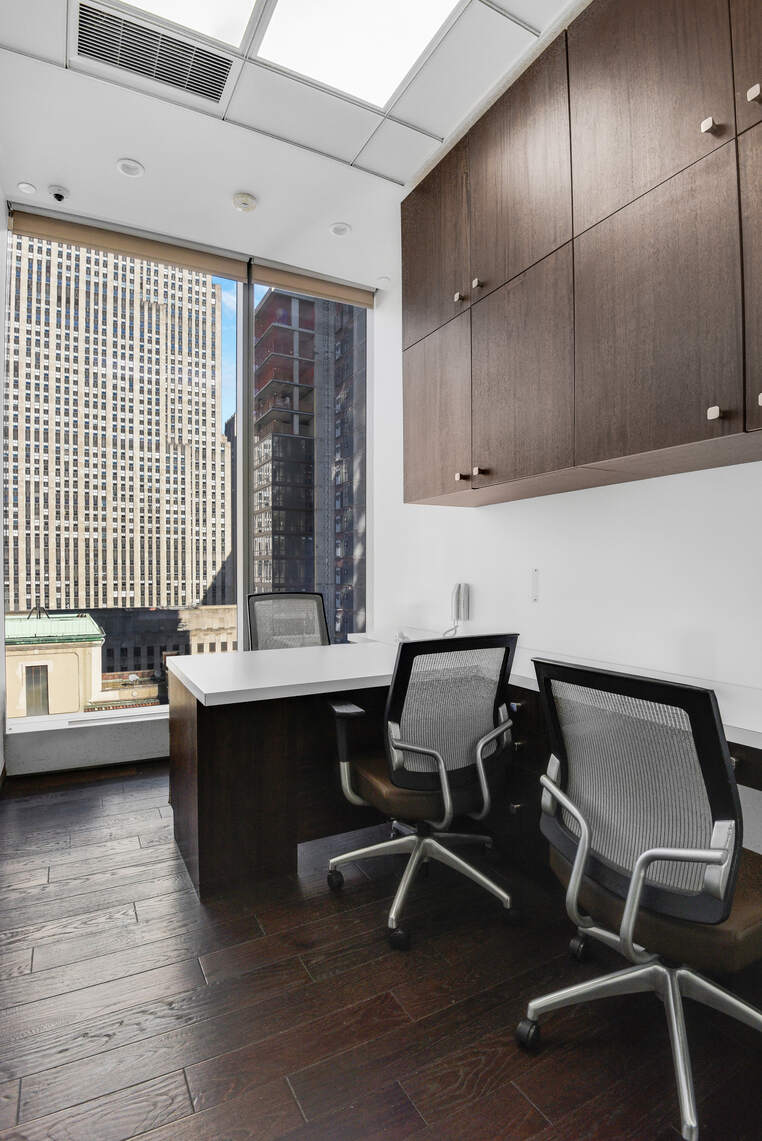 50 West 47th Street, Unit Undisclosed Manhattan, NY 10036 - Photo 4 of 27 a view of a room with gym equipment