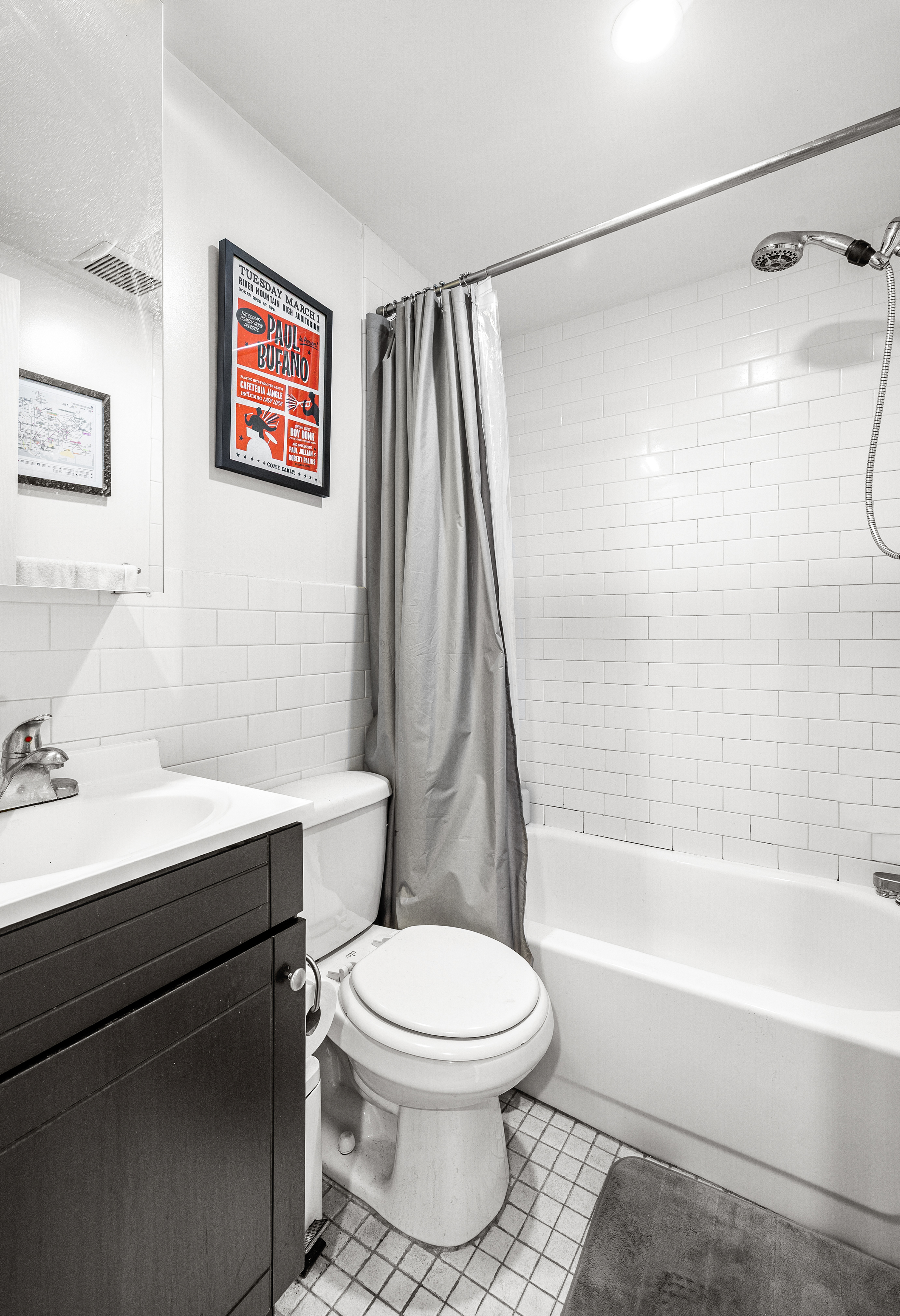 82 East 7th Street, Unit 2 Manhattan, NY 10003 - Photo 9 of 11 a bathroom with a toilet a sink and a bathtub