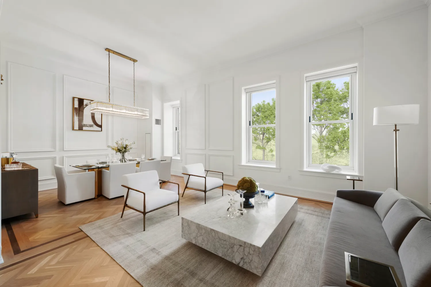 a living room with furniture a rug a lamp and a large window