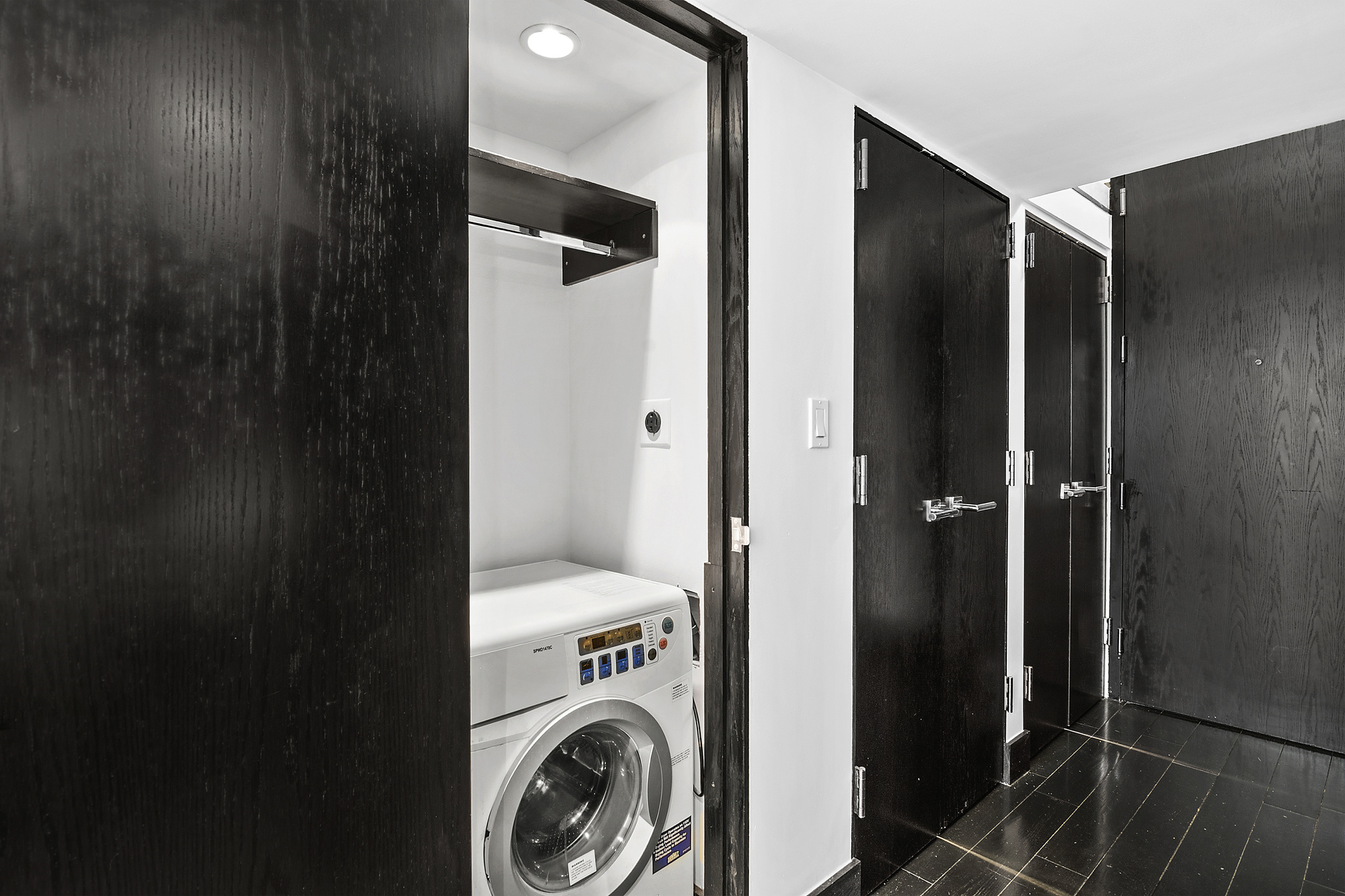 254 Park Avenue South, Unit 3G Manhattan, NY 10010 - Photo 4 of 12 a view of bathroom with washer and dryer