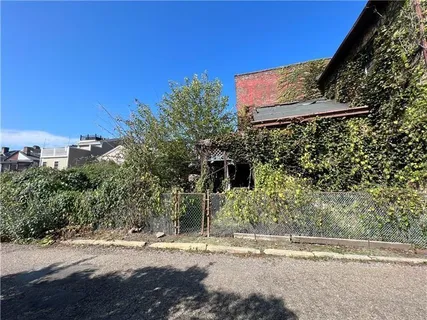 a street sign on a pole on a street