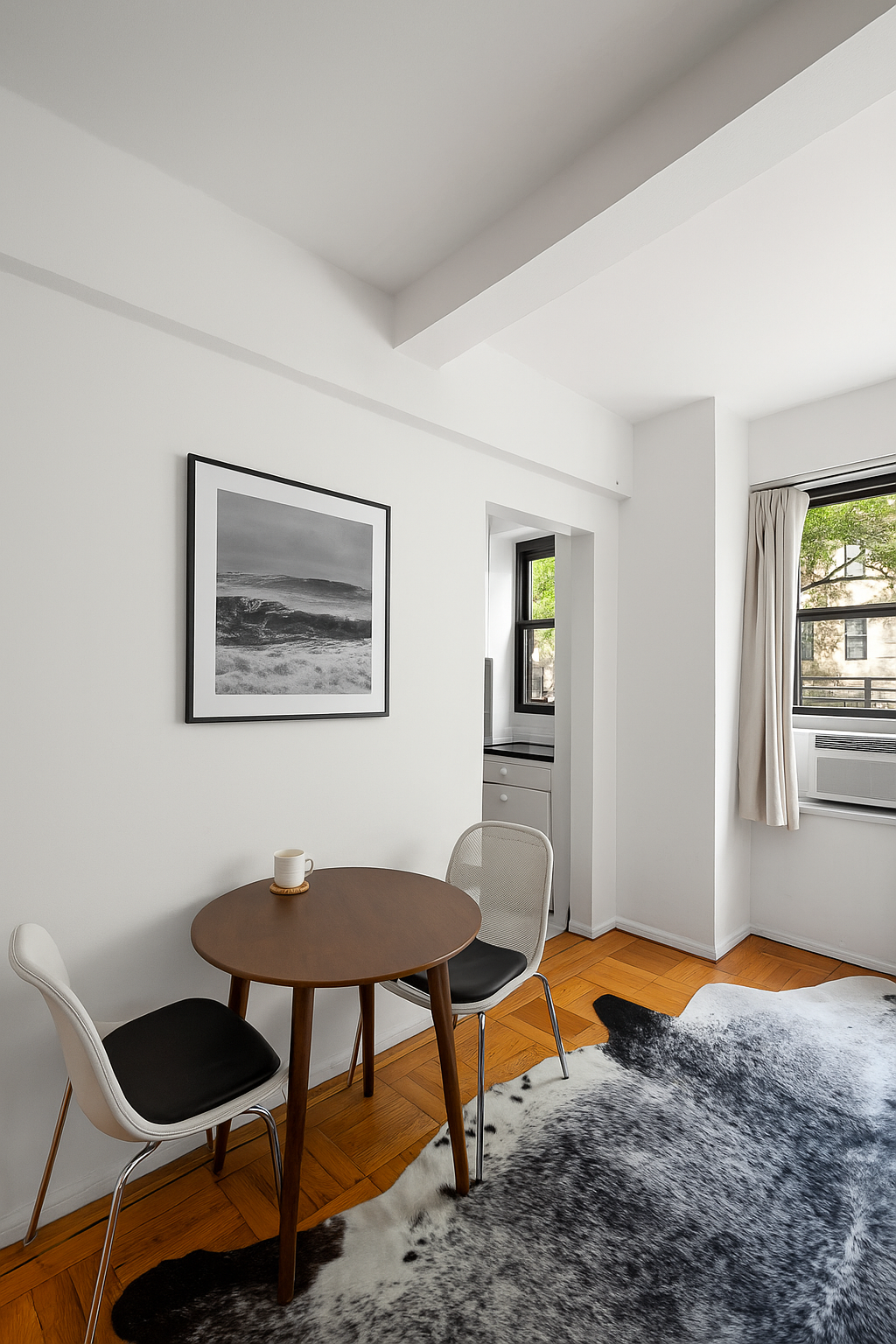 30 East 37th Street, Unit 2E Manhattan, NY 10016 - Photo 2 of 8 a workspace with furniture and window