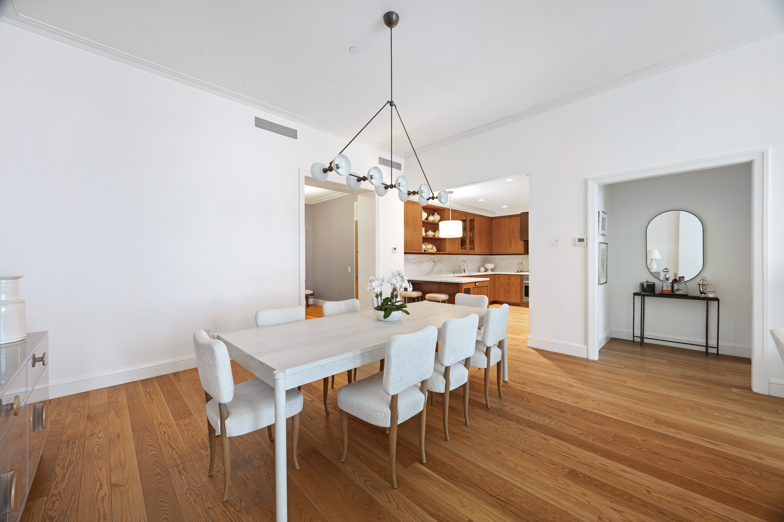 71 Laight Street, Unit 2F Manhattan, NY 10013 - Photo 4 of 20 a view of a dining room with furniture window and wooden floor