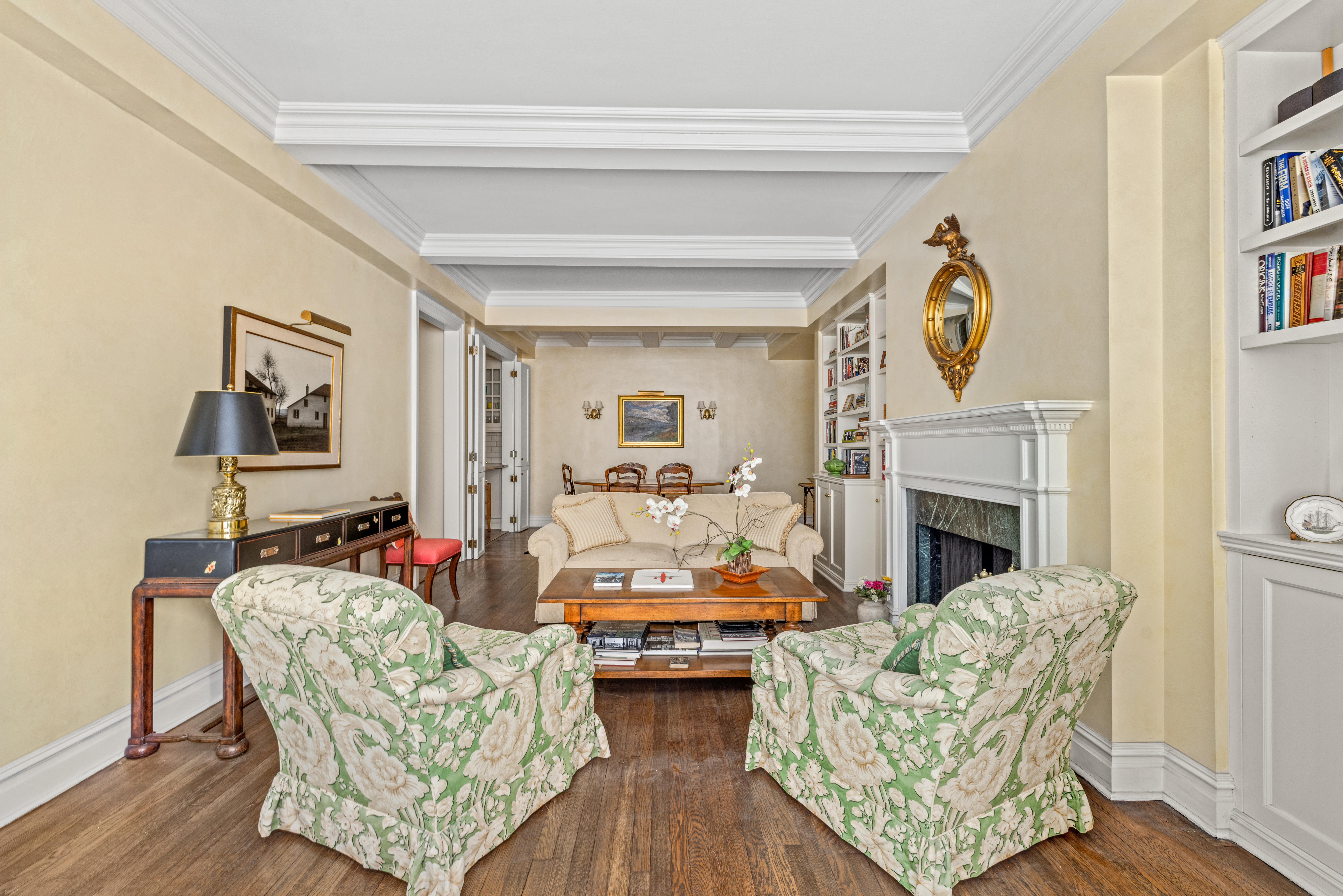 75 Central Park West, Unit 5A Manhattan, NY 10023 - Photo 5 of 14 a living room with furniture and a fireplace