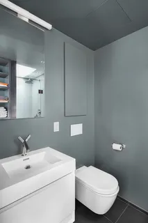 a bathroom with a sink and a toilet