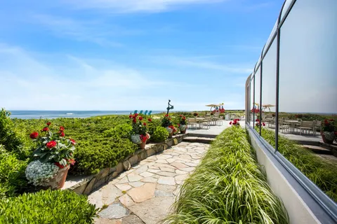a view of swimming pool from a balcony