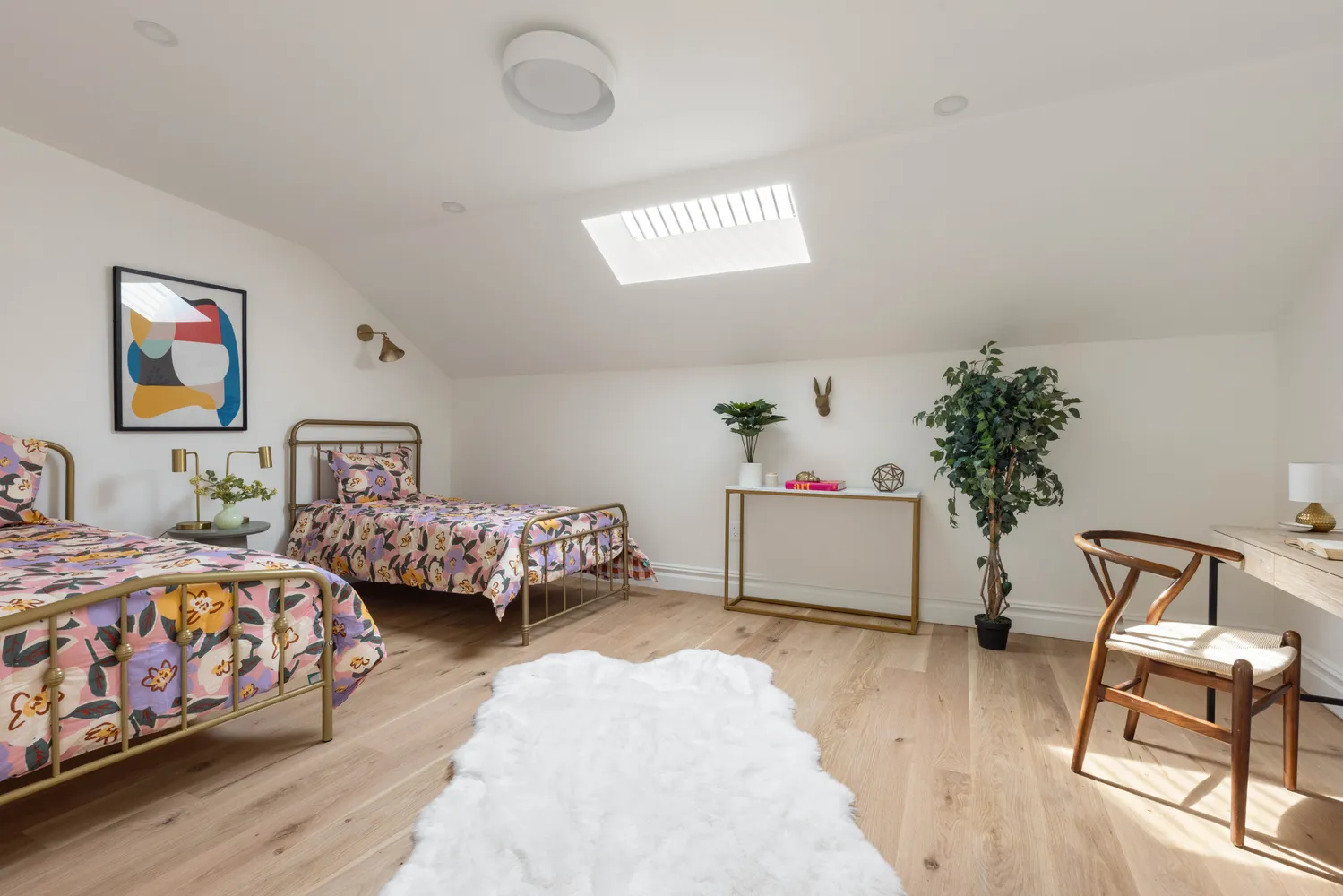 a bedroom with bed and a window