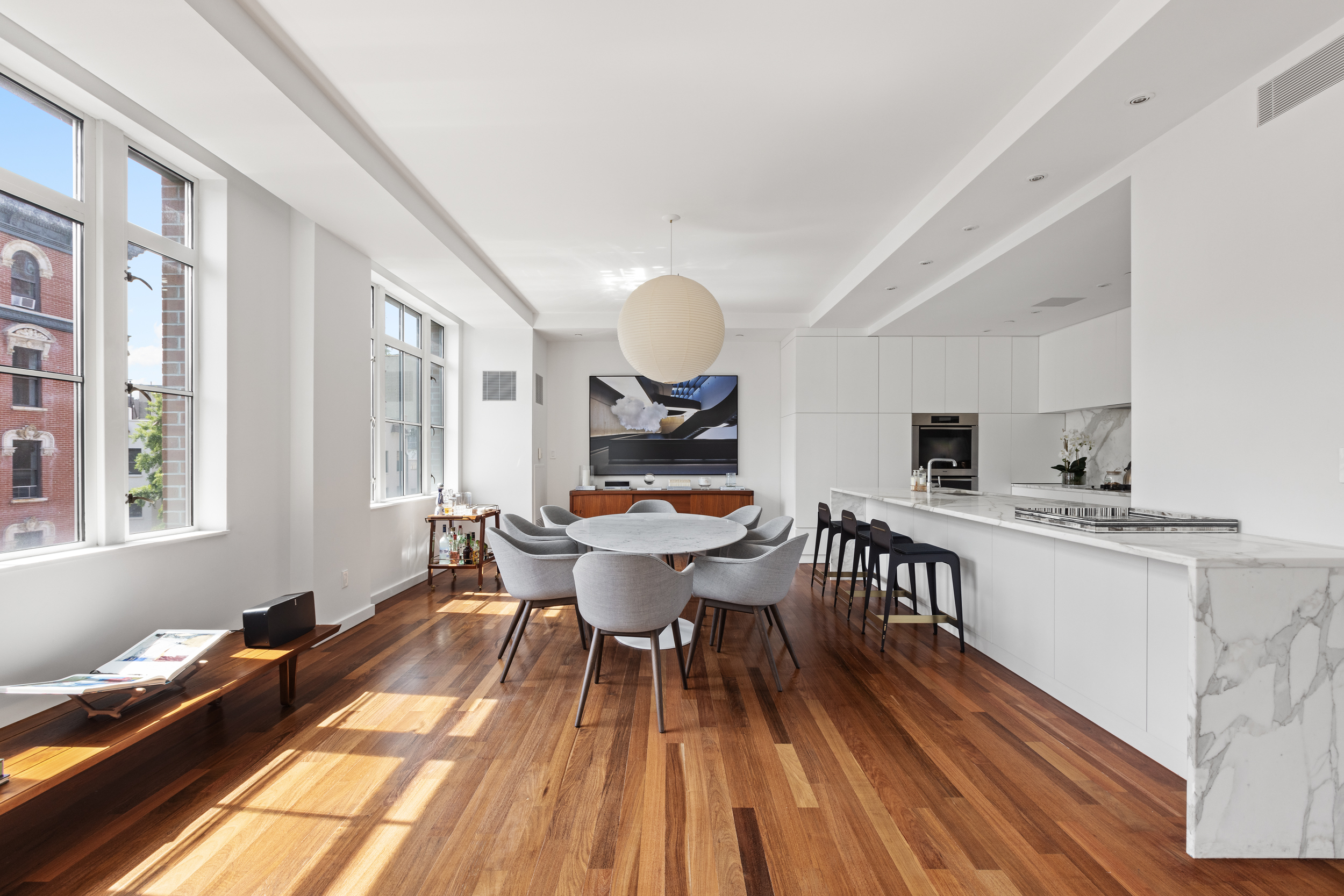744 Greenwich Street, Unit 4 Manhattan, NY 10014 - Photo 9 of 34 a living room with a sink and a table