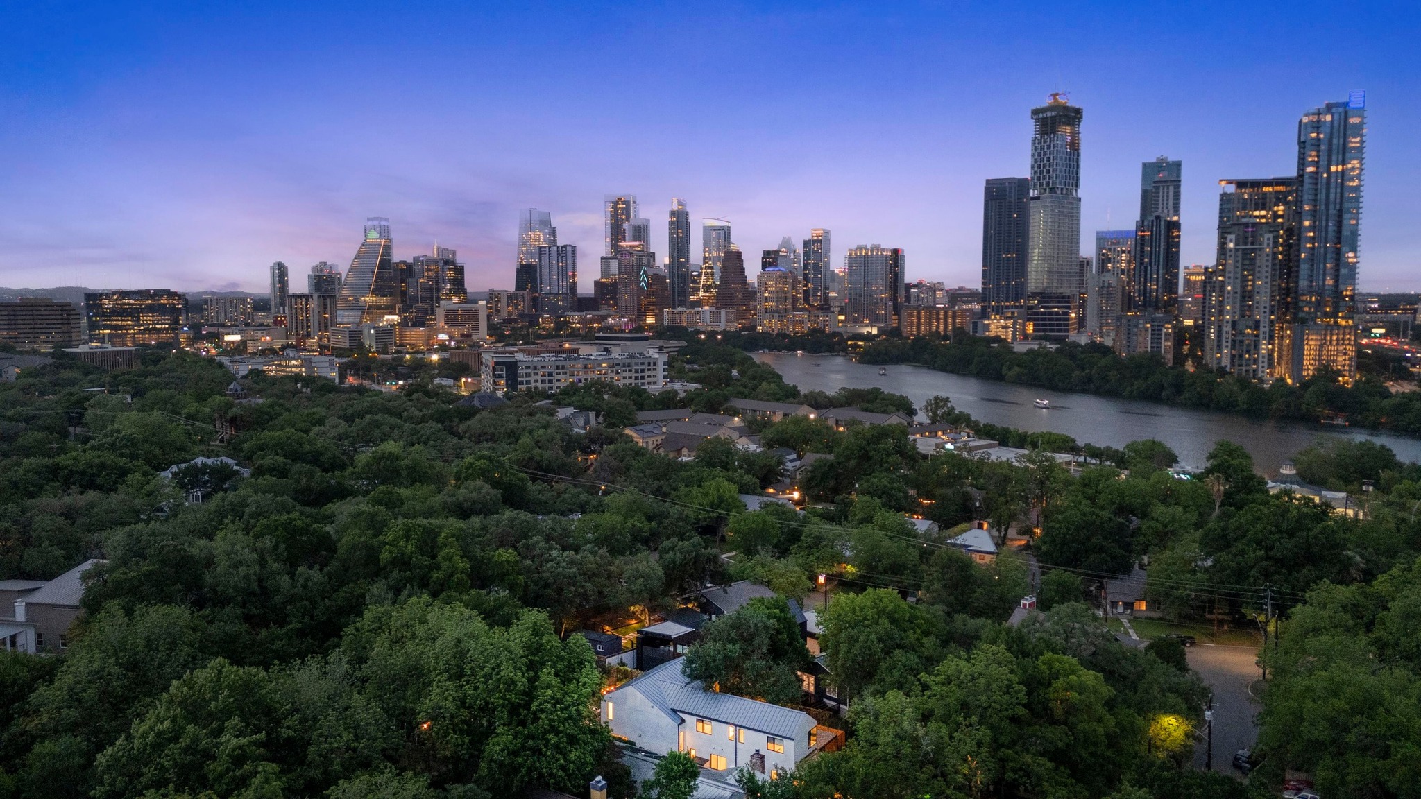1206 Bickler Road Austin, TX 78704 - Photo 2 of 65 a view of a city with tall buildings