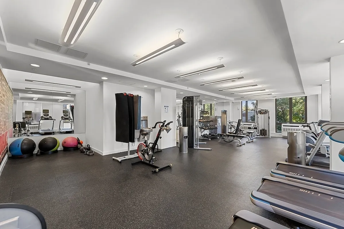 626 Flatbush Avenue, Unit 12D Brooklyn, NY 11225 - Photo 9 of 18 a view of a room with gym equipment