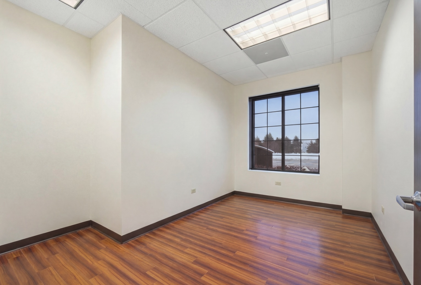 6475 Washington Street Gurnee, IL 60031 - Photo 37 of 45 an empty room with wooden floor and windows