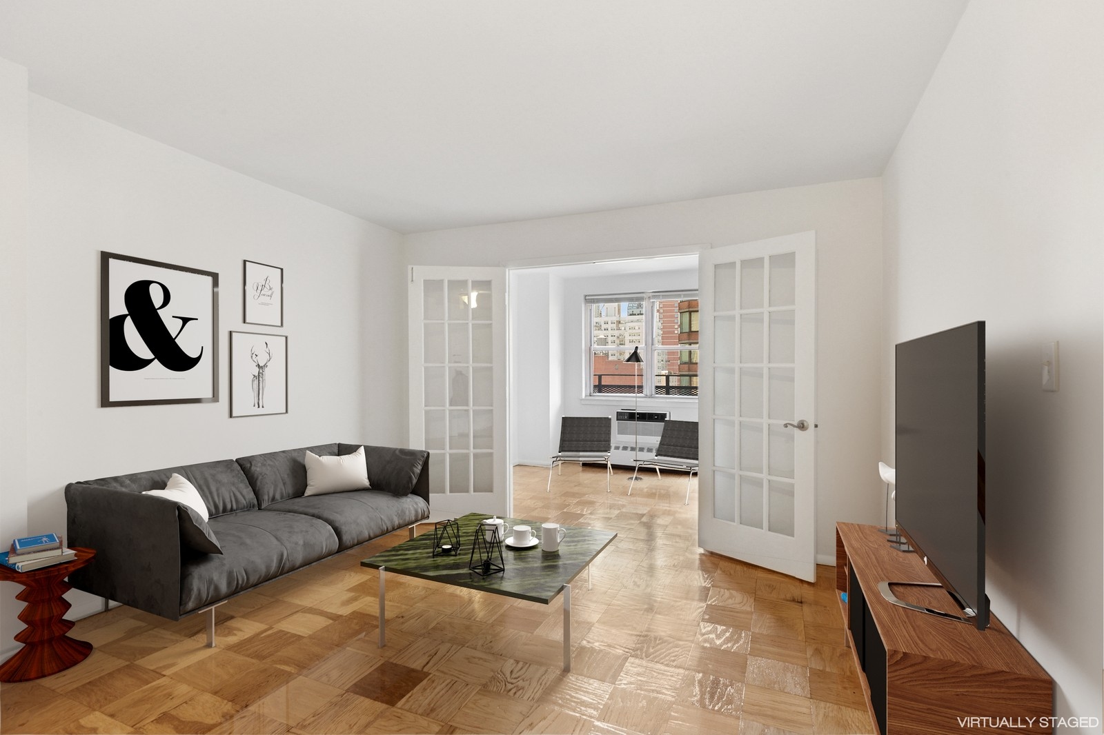 333 East 79th Street, Unit 9Y Manhattan, NY 10075 - Photo 2 of 11 a living room with furniture and a flat screen tv