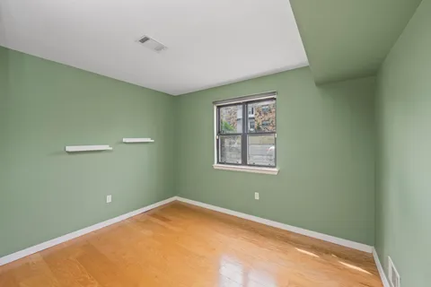 a view of a room with a window