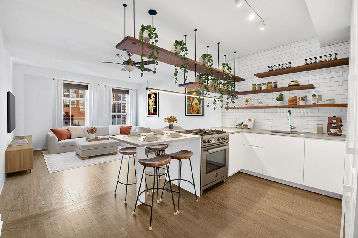 a kitchen with a sink stove and white cabinets with wooden floor