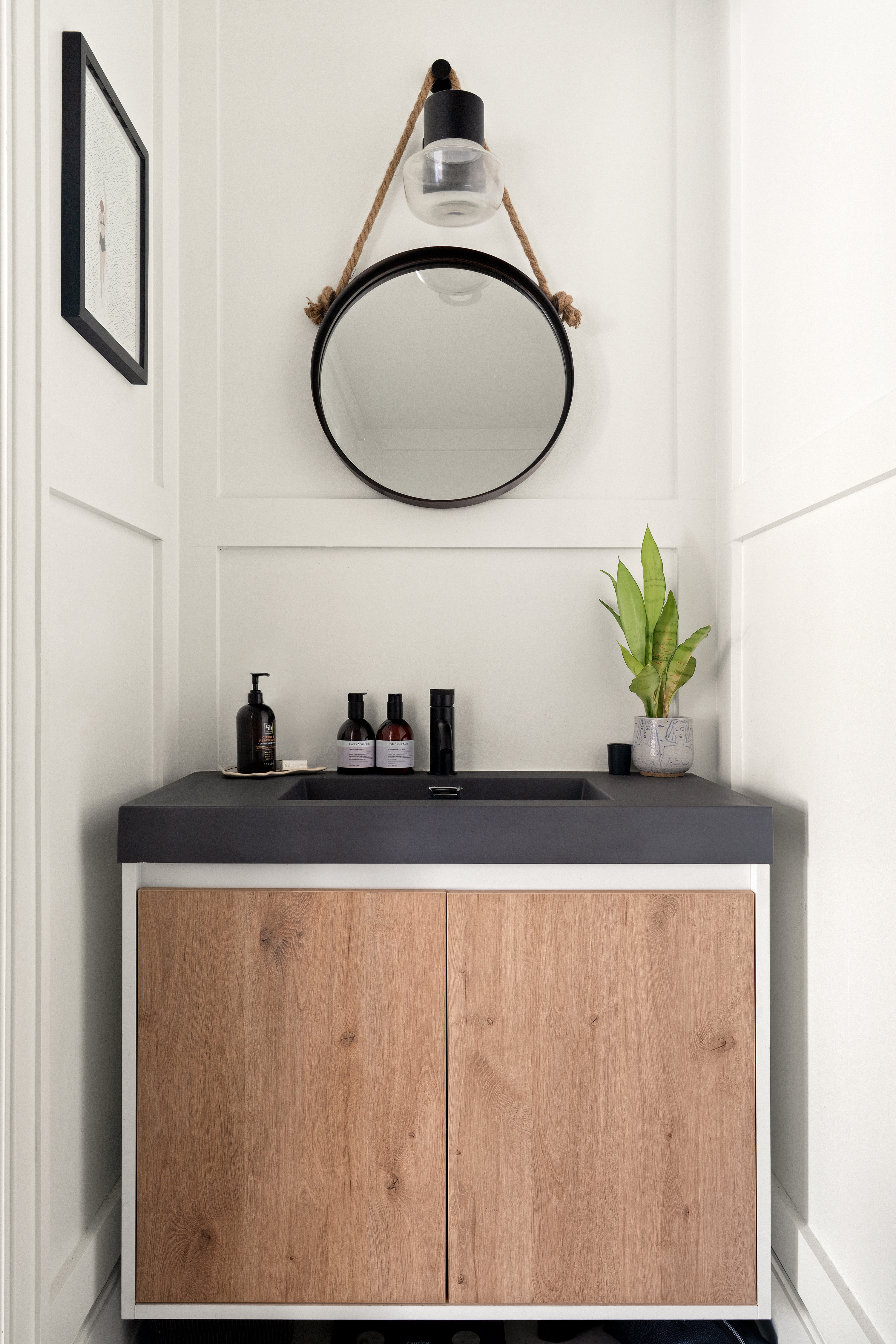 237 Rutland Road, Unit 1B Brooklyn, NY 11225 - Photo 6 of 9 a bathroom with a granite countertop sink and a mirror
