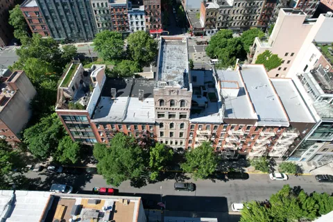 an aerial view of house with yard