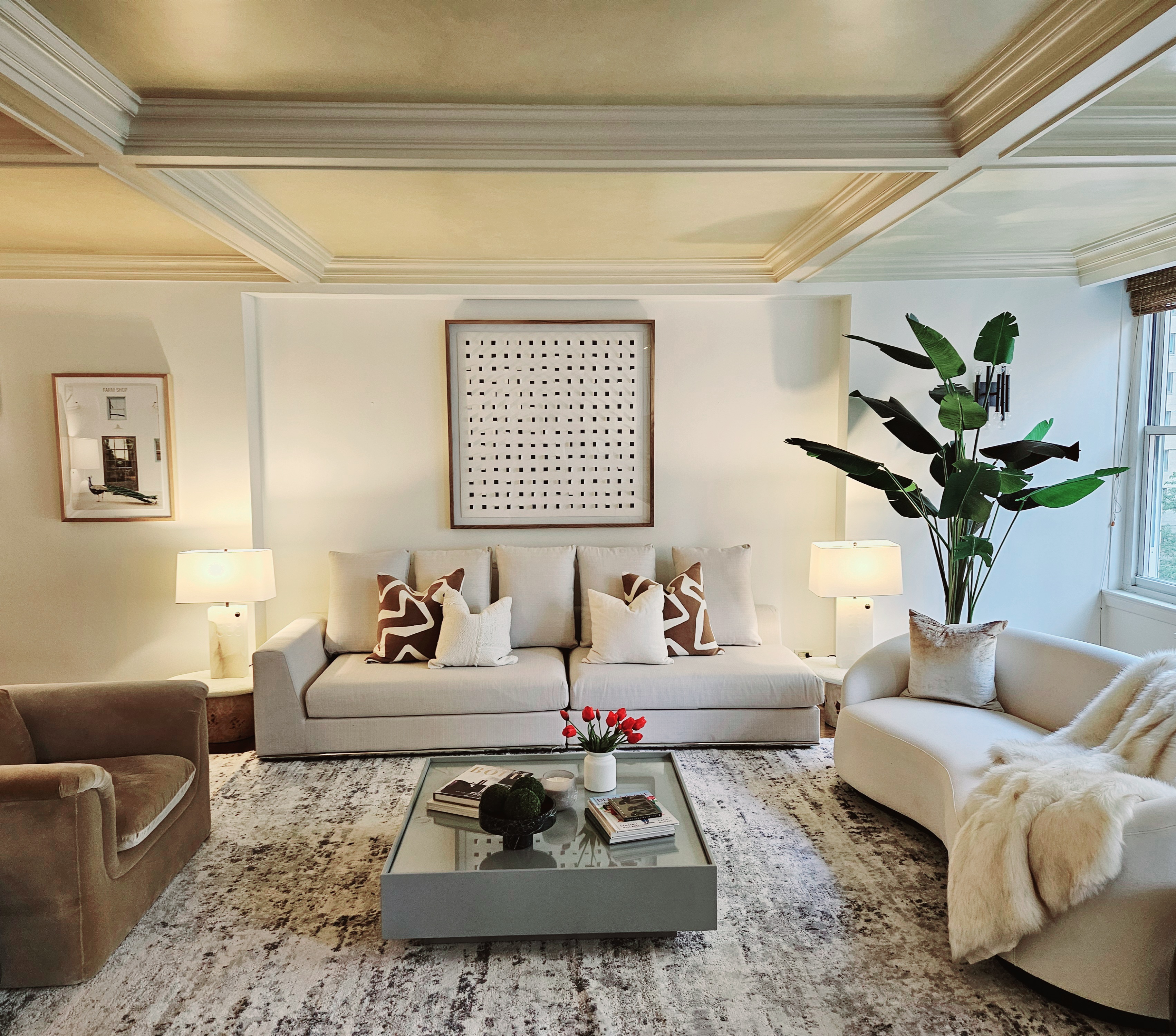 169 East 69th Street, Unit 7/8 B Manhattan, NY 10021 - Photo 6 of 30 a living room with furniture and a potted plant