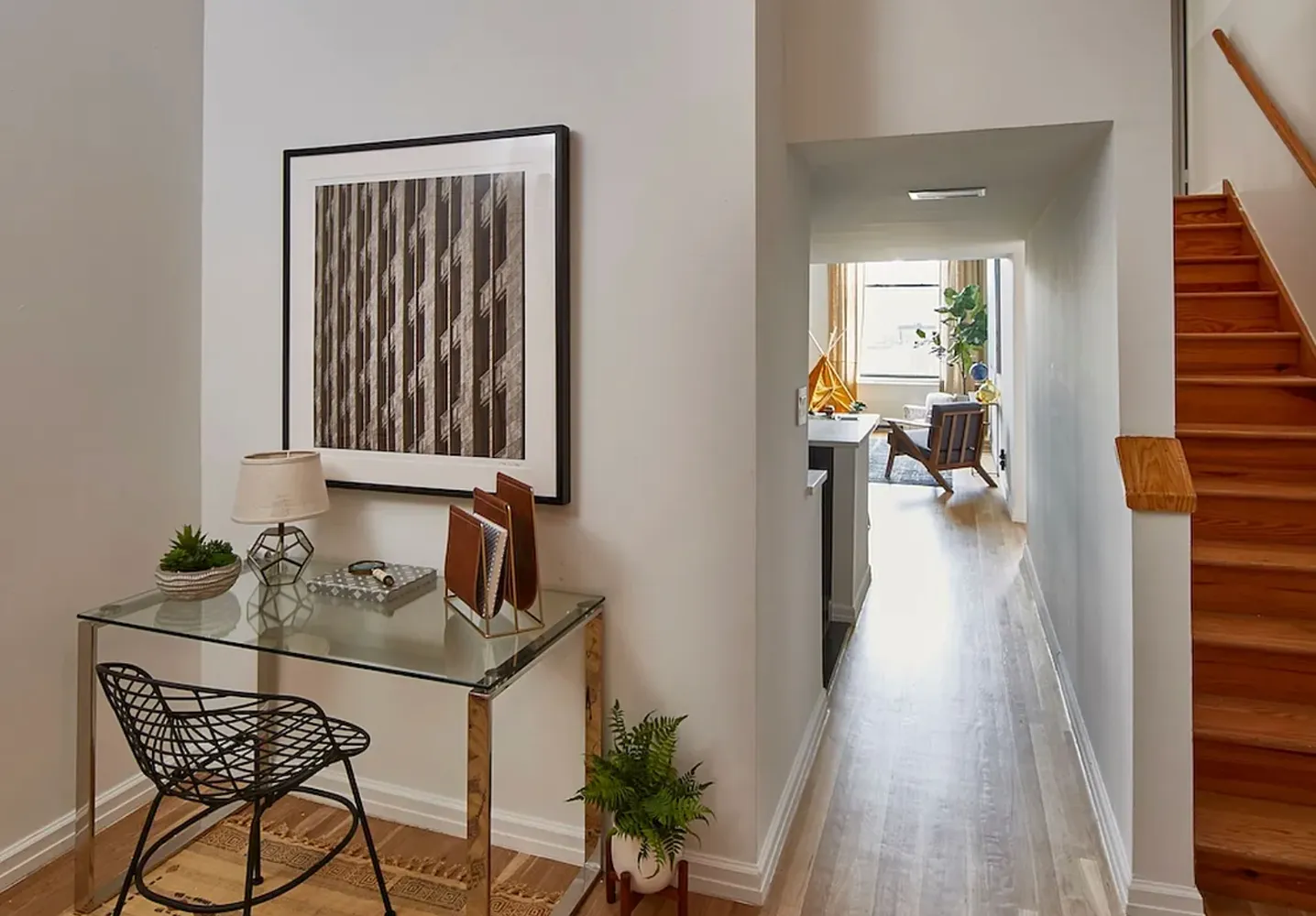 a picture of a book and a white wall