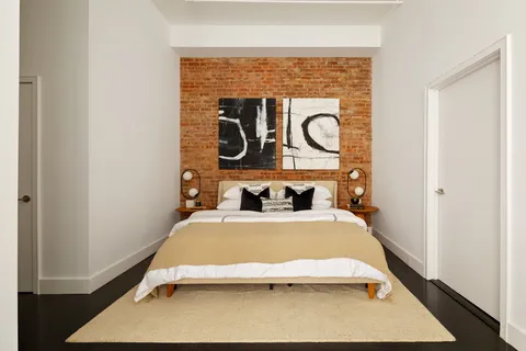 a room with a stove and a table