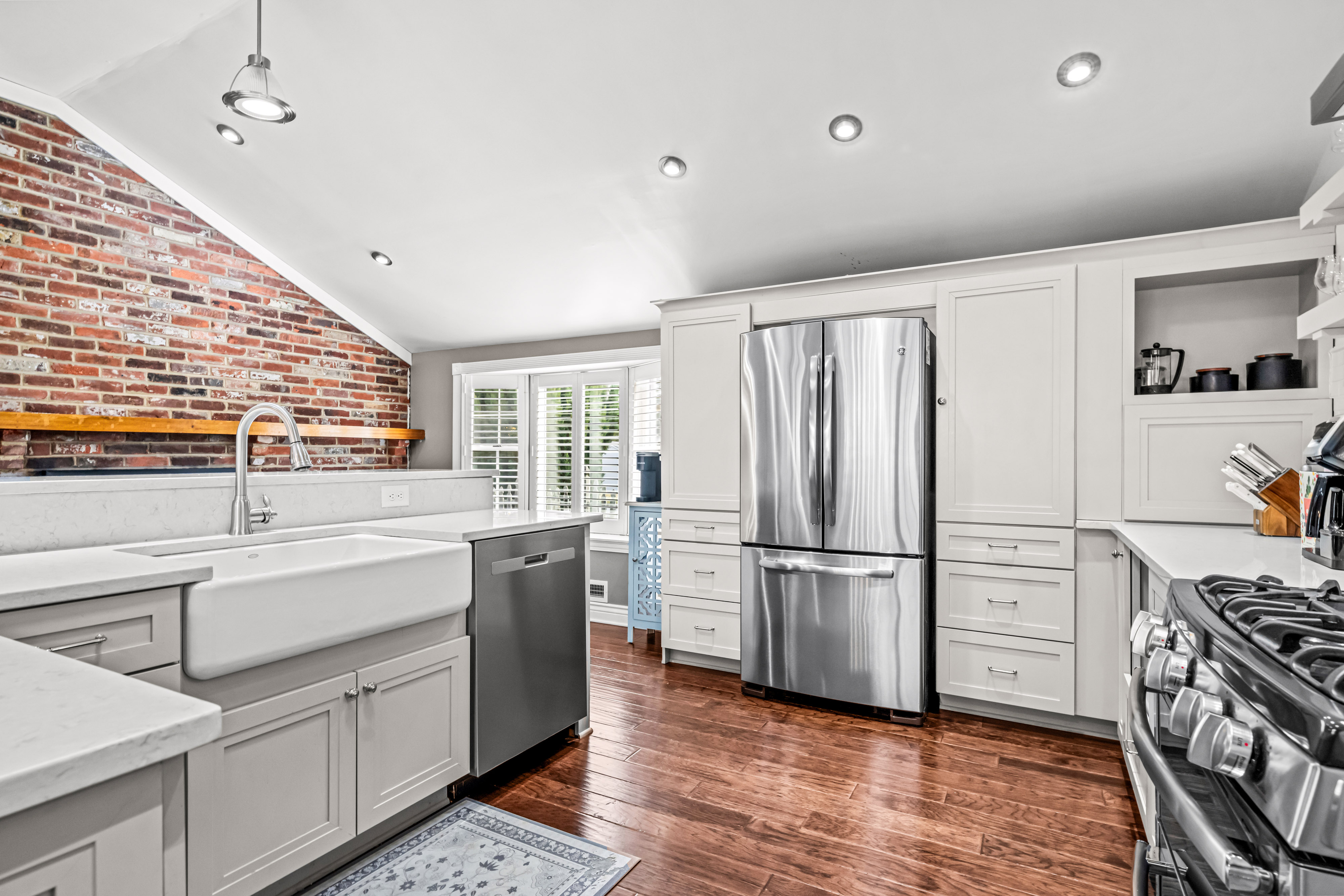 430 Pelham Road Cherry Hill, NJ 08034 - Photo 14 of 48 a kitchen with stainless steel appliances a refrigerator sink and cabinets