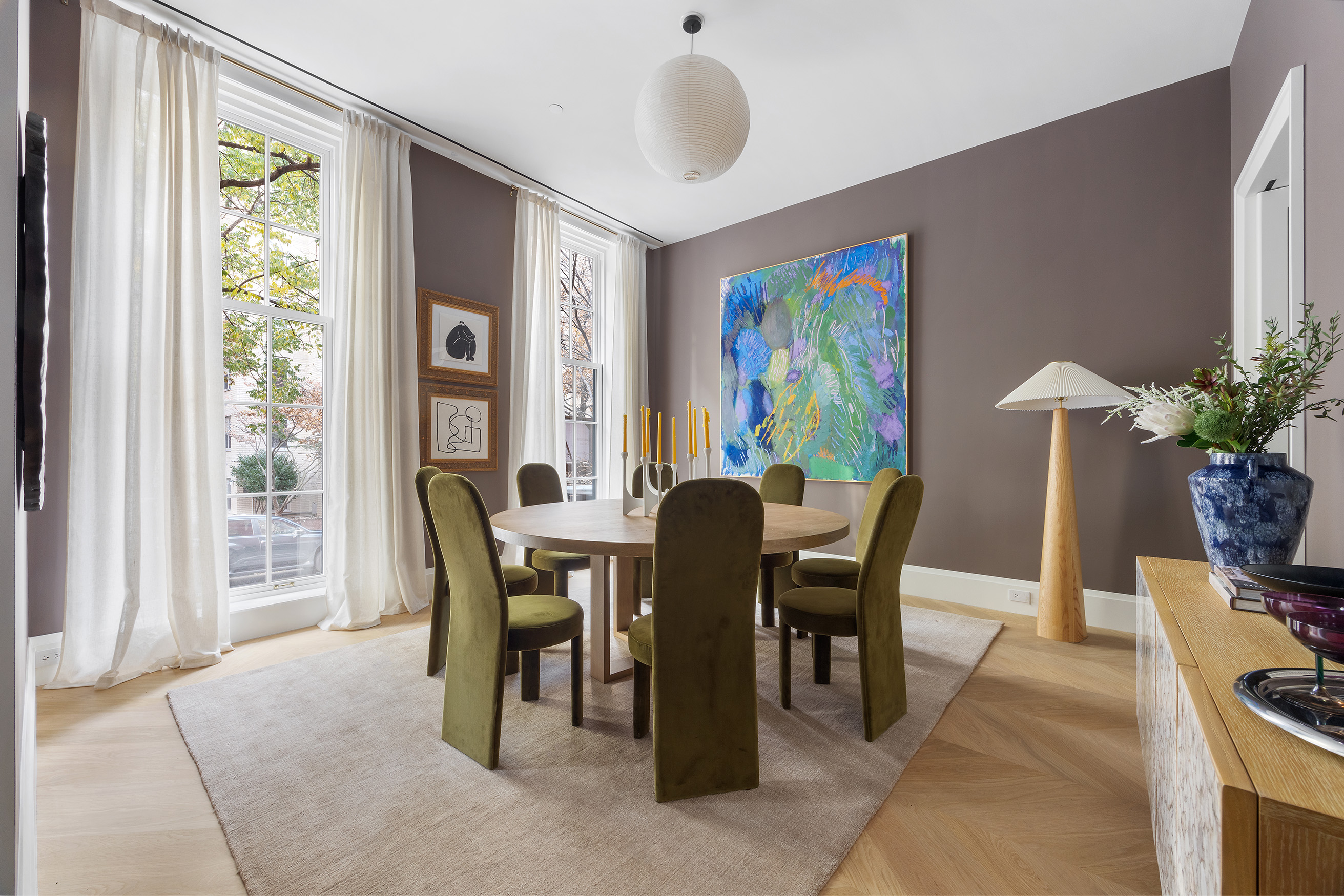 17 East 9th Street Manhattan, NY 10003 - Photo 10 of 32 a view of a dining room with furniture and a potted plant