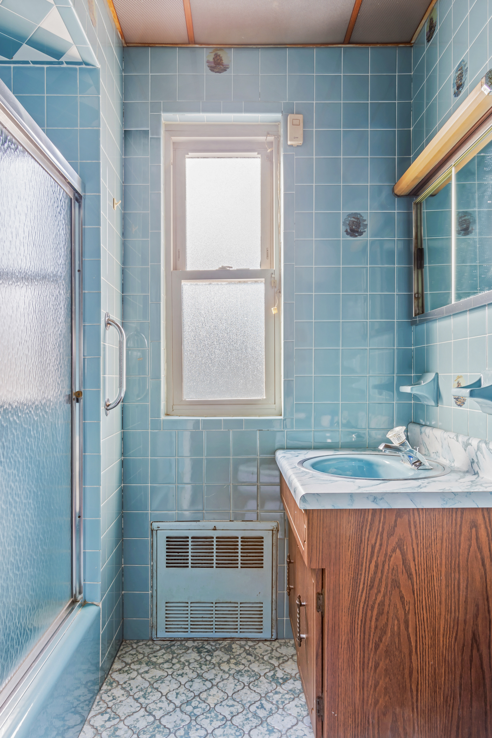 686 Rugby Road Brooklyn, NY 11230 - Photo 11 of 18 a bathroom with a sink and a mirror