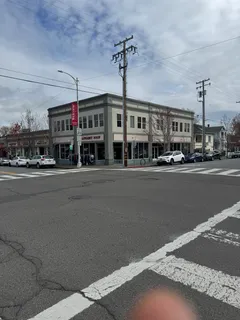 a bathroom with a black white checkered floor