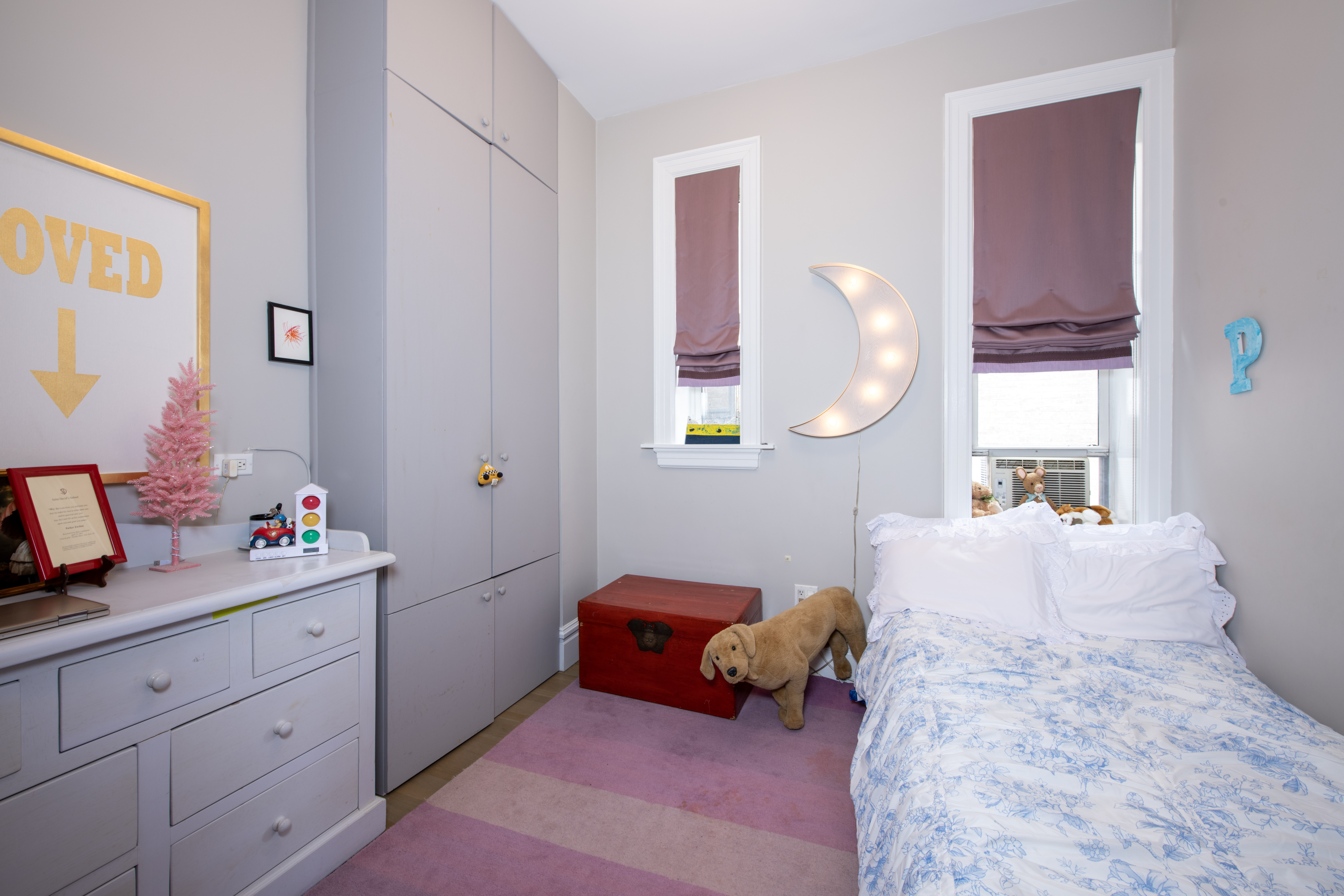 194 Riverside Drive, Unit 5C/6C Manhattan, NY 10025 - Photo 9 of 26 a bedroom with a bed and window