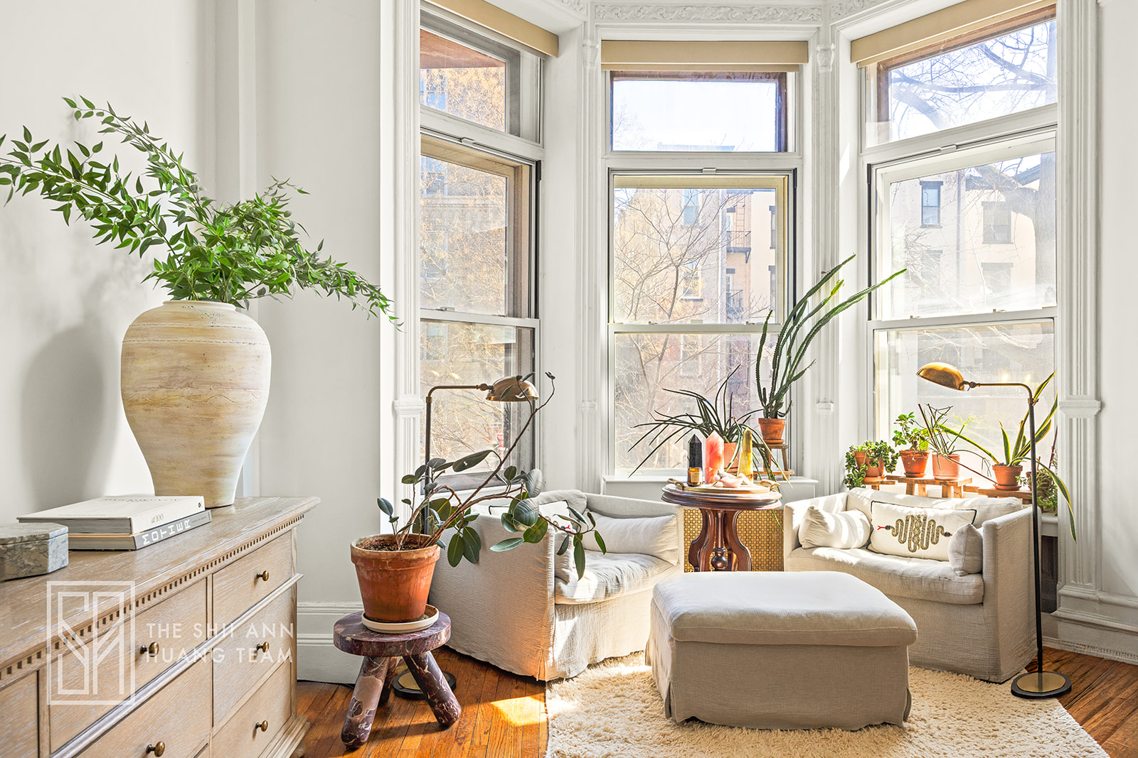 10 8th Avenue, Unit 2 Brooklyn, NY 11217 - Photo 11 of 18 a living room with furniture and floor to ceiling windows