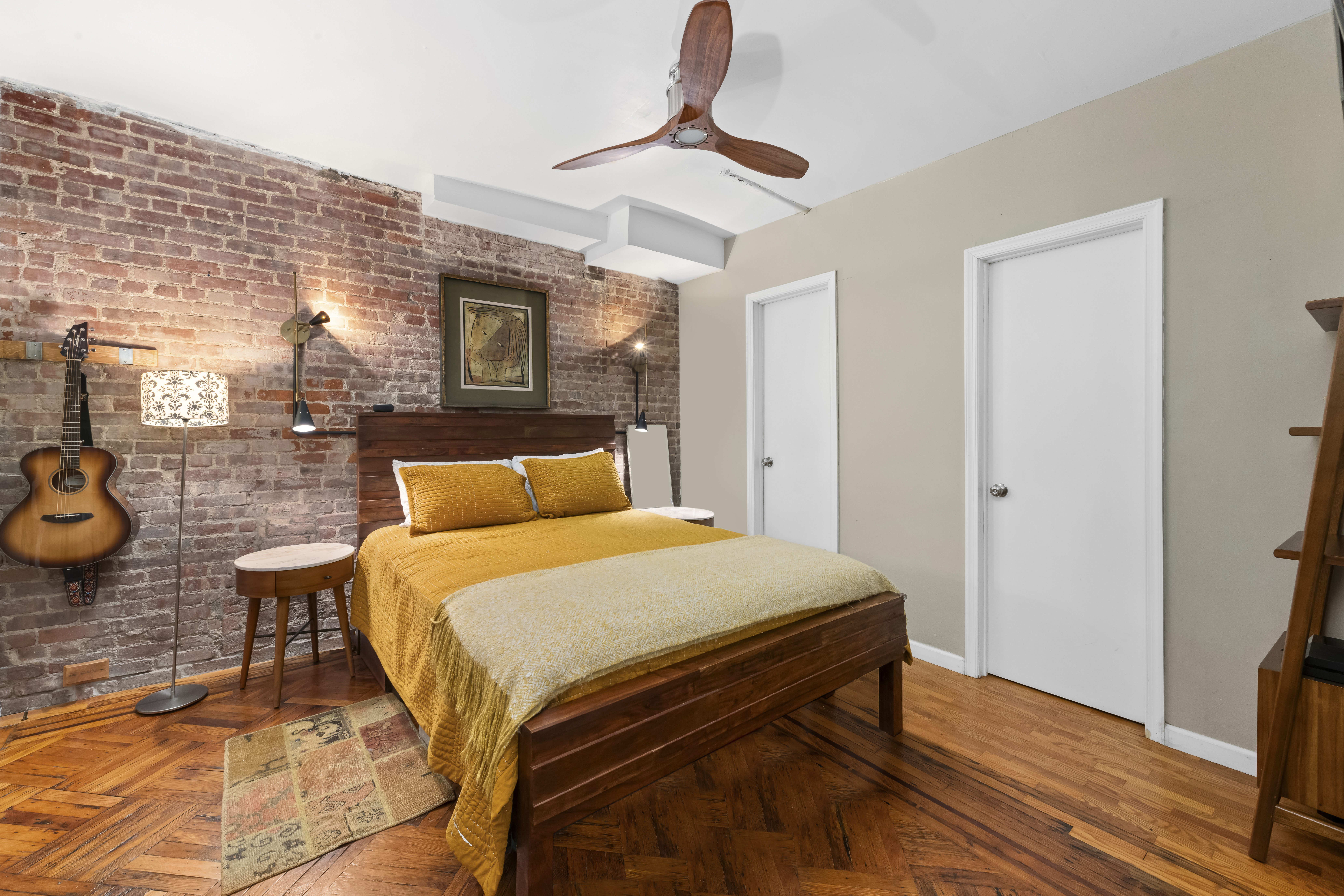 61 West 88th Street, Unit 1B/F Manhattan, NY 10024 - Photo 7 of 12 a bedroom with bed and wooden floor