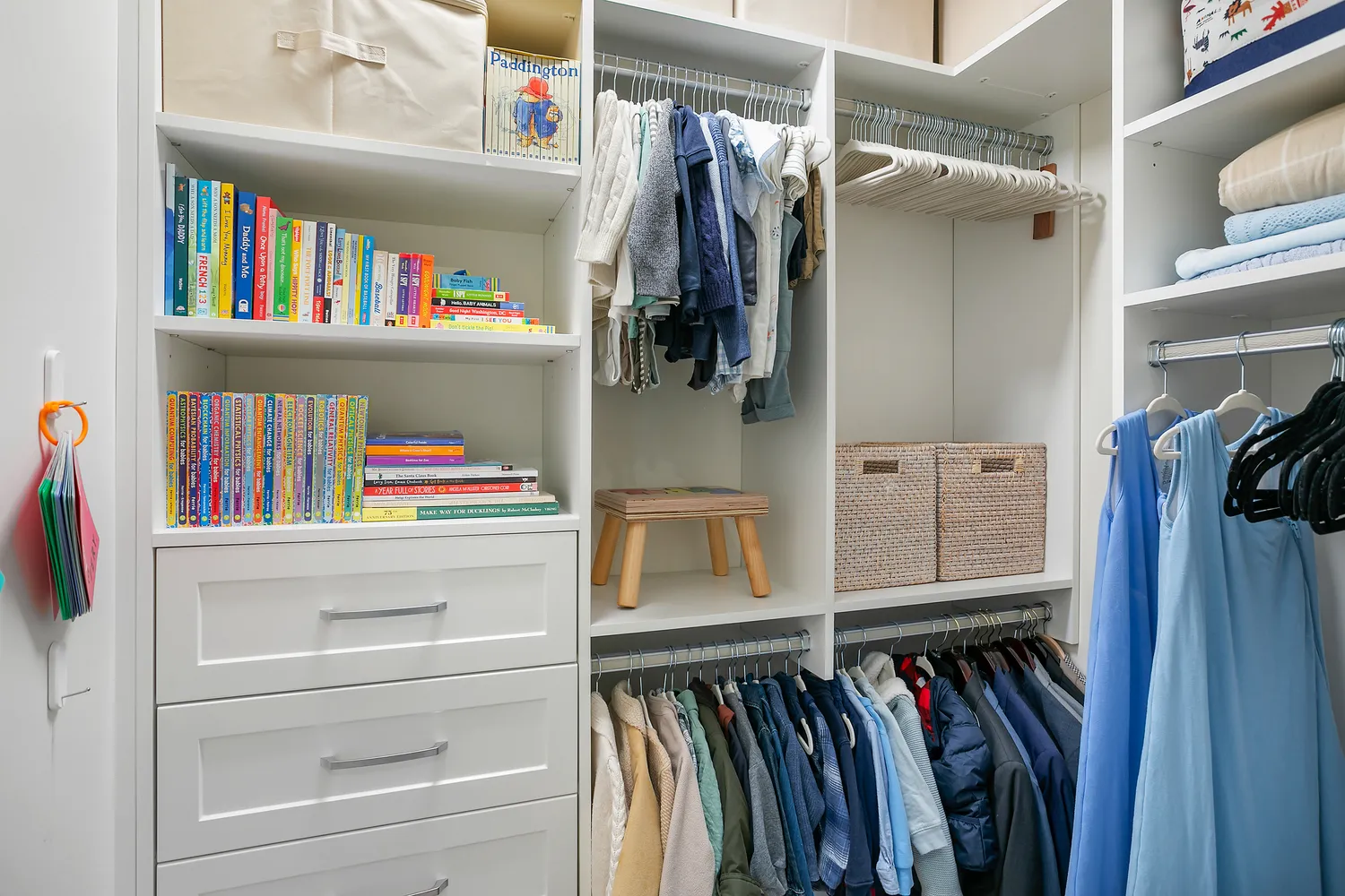 a hallway with front door and wooden floor