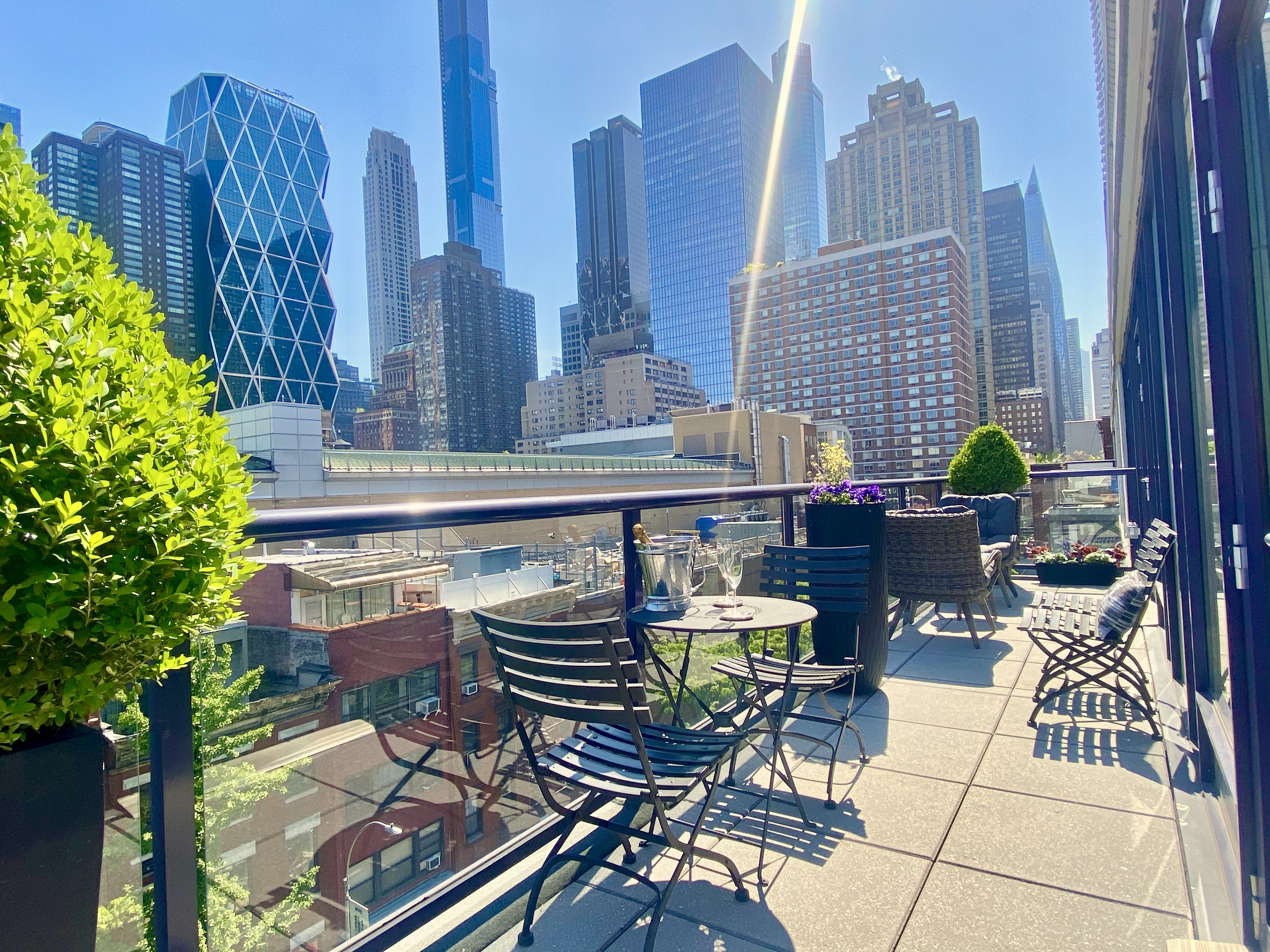 350 West 53rd Street, Unit PHB Manhattan, NY 10019 - Photo 6 of 34 a view of a patio with couple of chairs