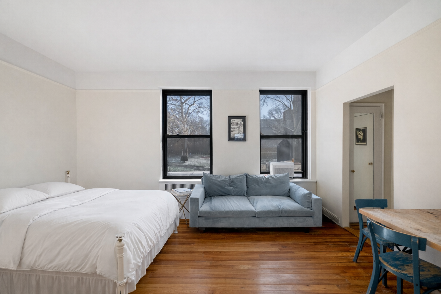 101 West 80th Street, Unit 2C Manhattan, NY 10024 - Photo 4 of 7 a spacious bedroom with a bed and wooden floor