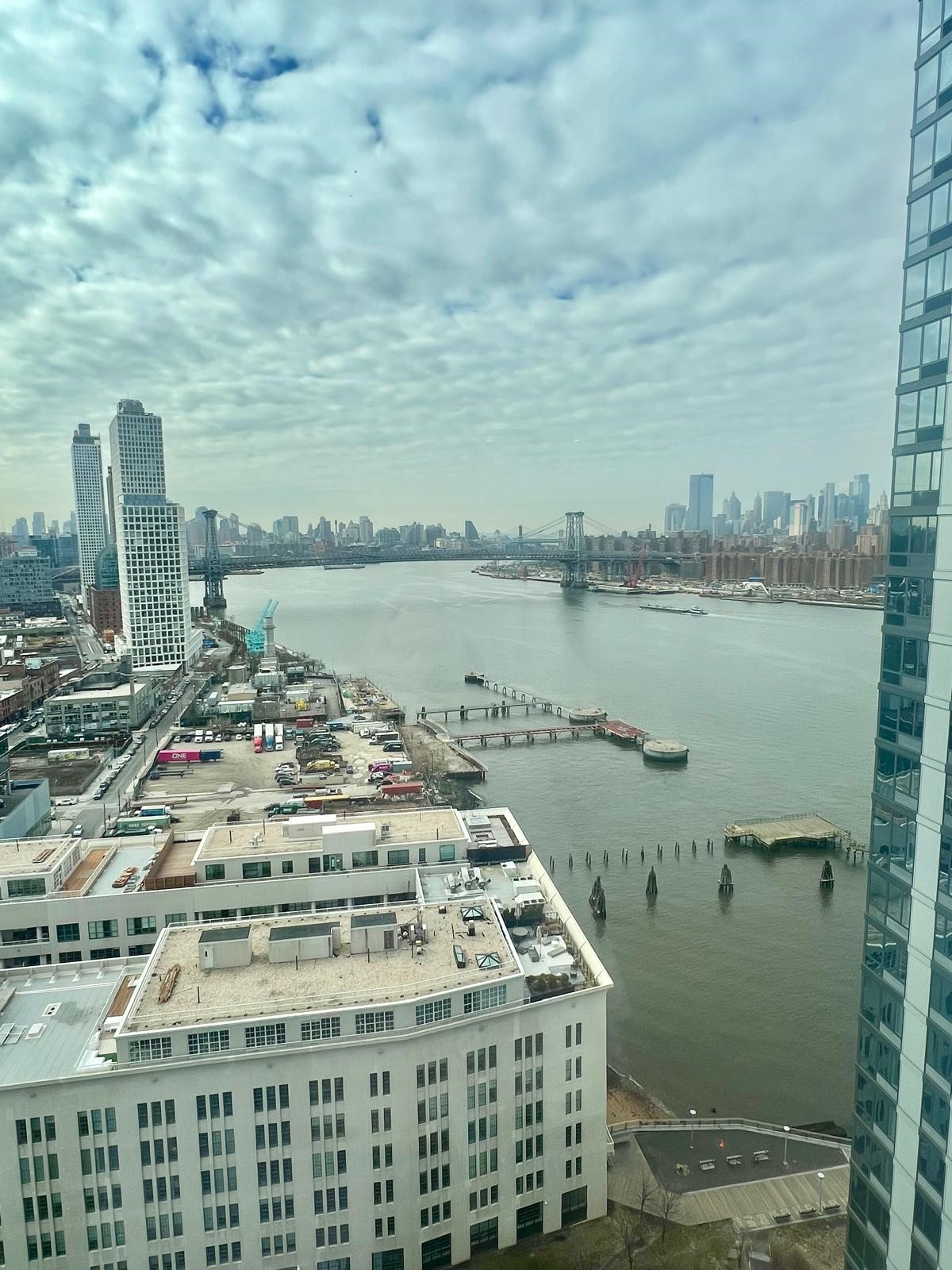 2 Northside Piers, Unit 26C Brooklyn, NY 11249 - Photo 6 of 21 a view of a lake with building in front of it