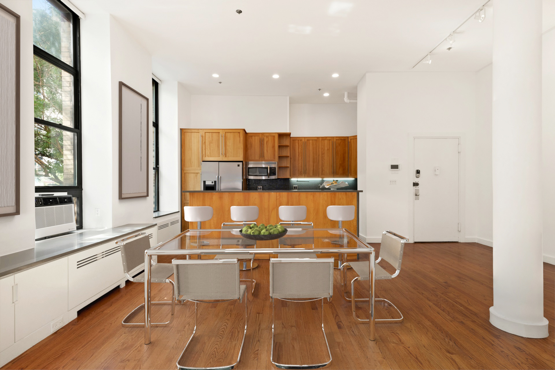 520 LaGuardia Place, Unit 2N Manhattan, NY 10012 - Photo 5 of 20 a dining room with furniture and wooden floor