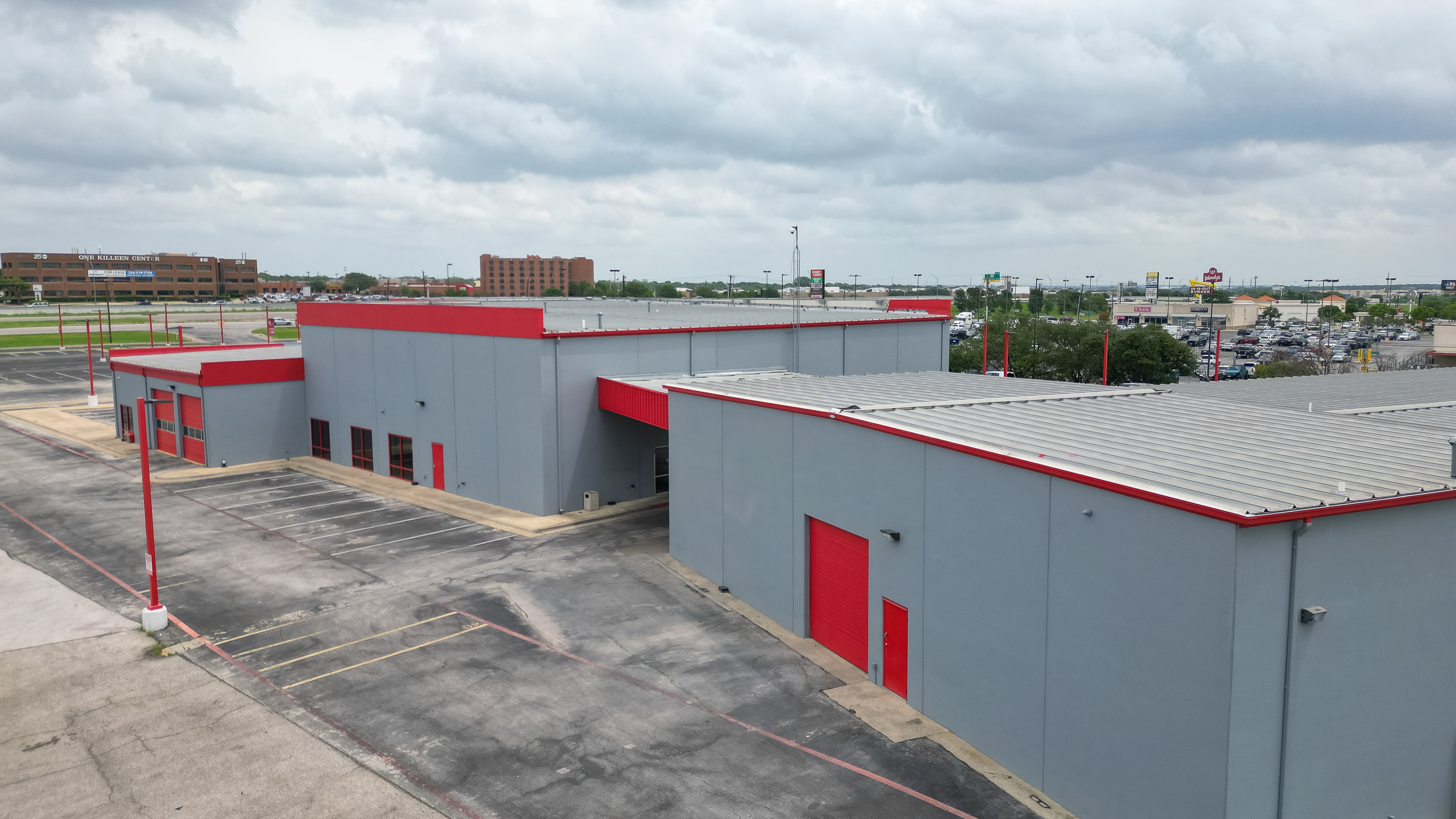 1902 East Central Texas Expressway Killeen, TX 76542 - Photo 19 of 61 a utility room with stainless steel appliances and trees