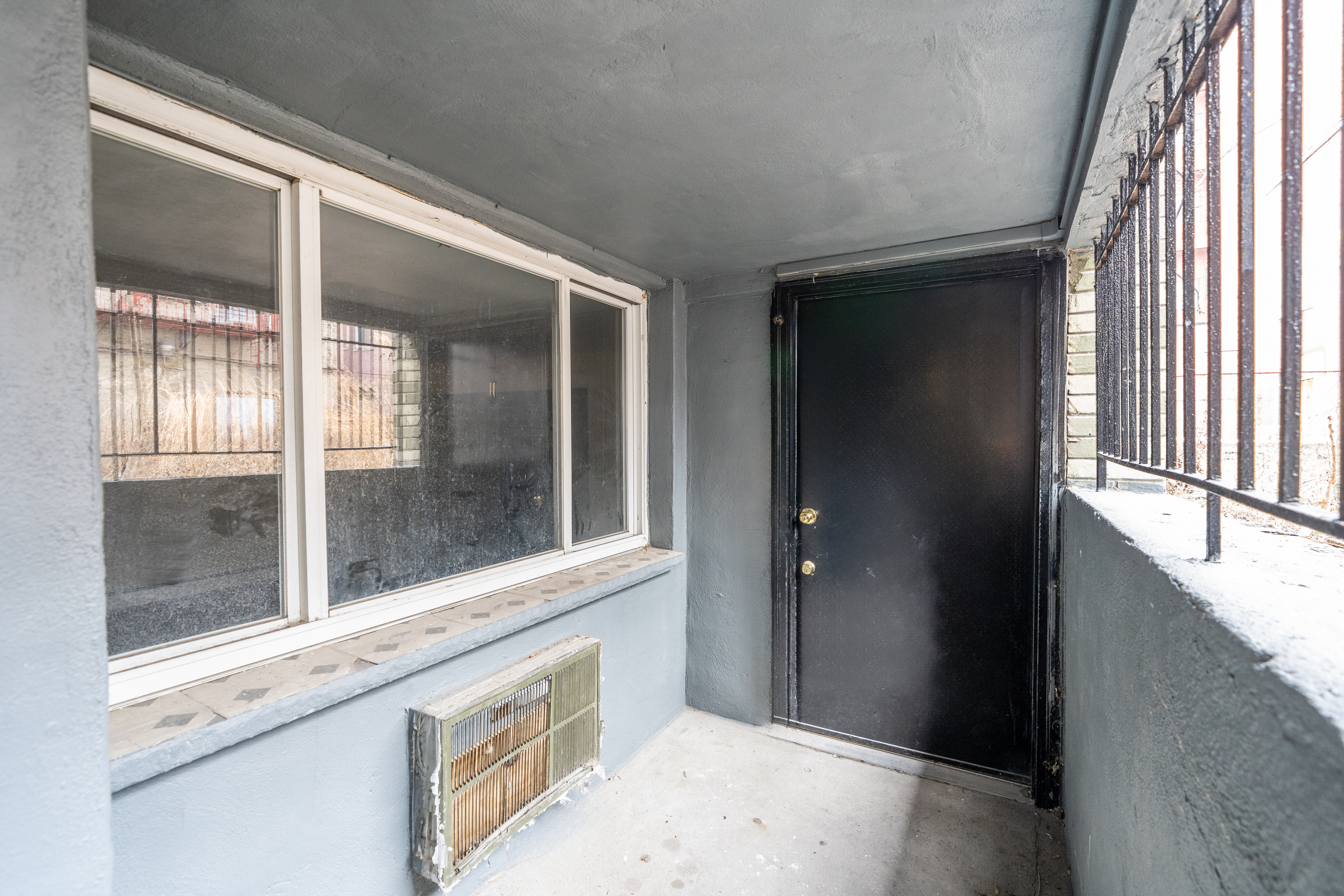 100-108 35th Street Union City, NJ 07087 - Photo 16 of 17 a view of a bathroom with a sink and window