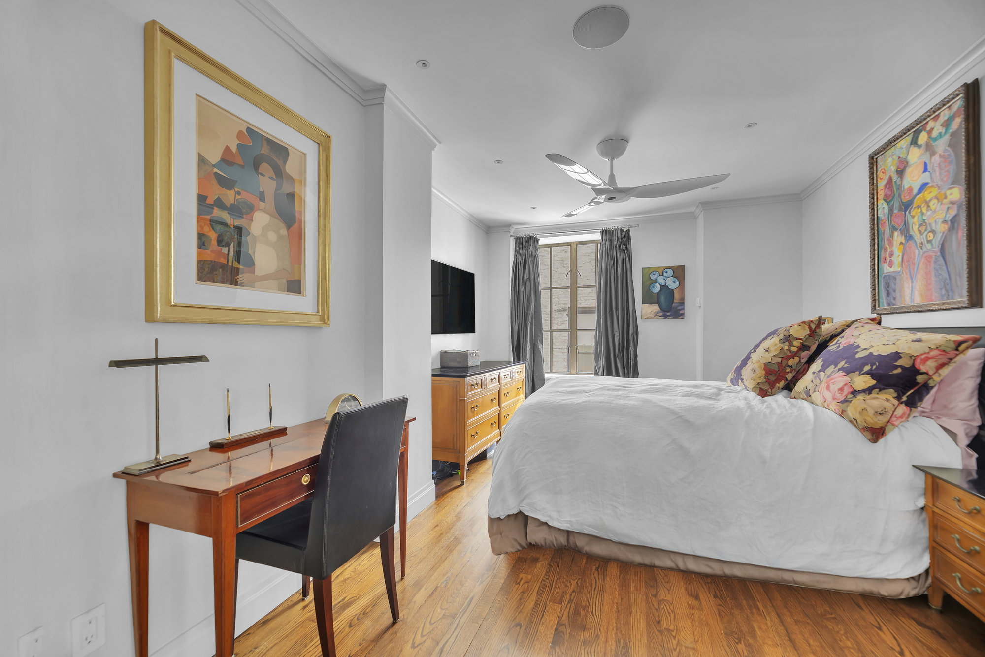 330 West End Avenue, Unit 2B Manhattan, NY 10023 - Photo 8 of 14 a bedroom with a bed and a table